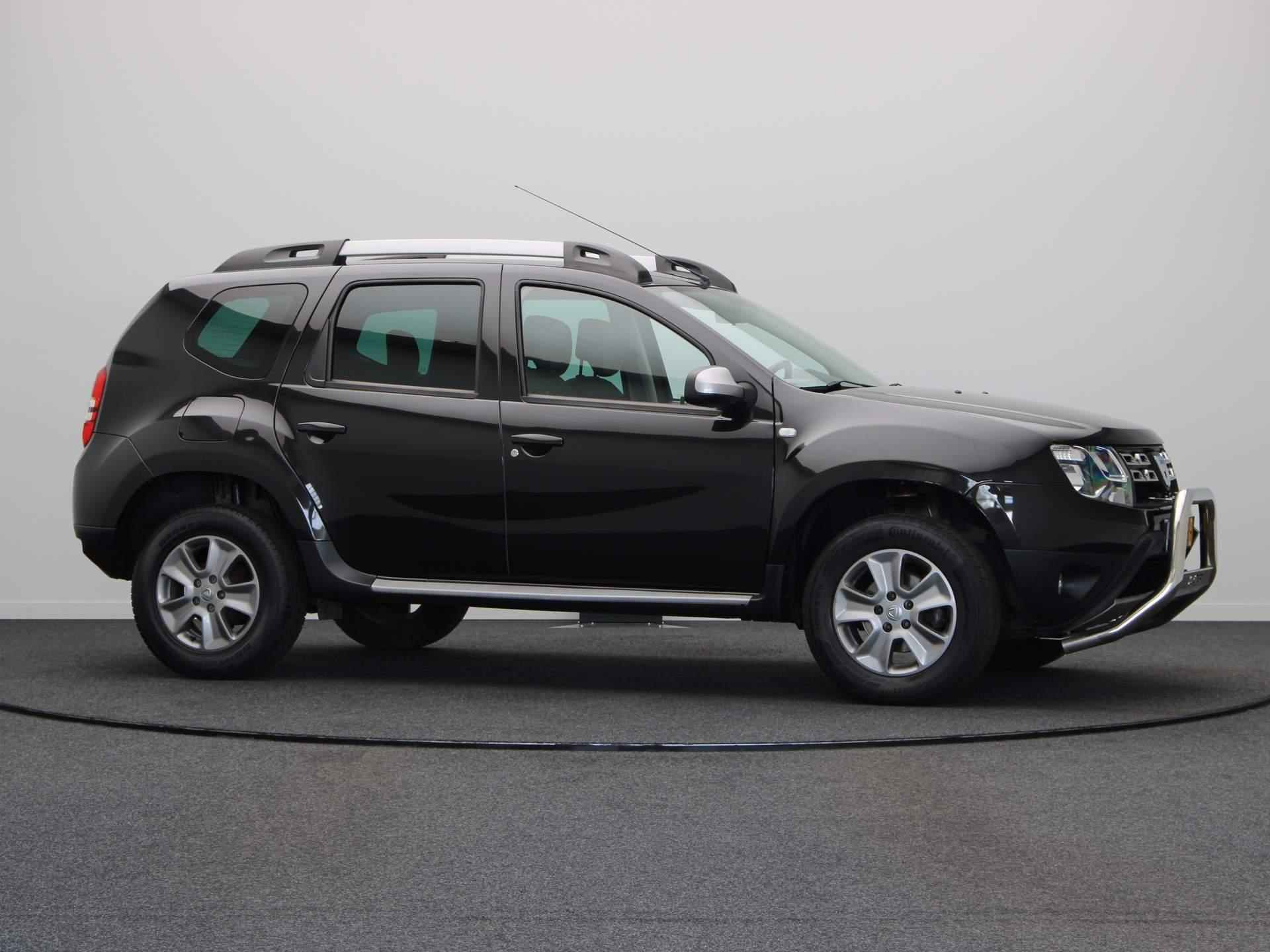 Dacia Duster TCe 125pk 4x2 Prestige | Trekhaak | Navigatie | Lederen Bekleding | Cruise Control | - 13/45