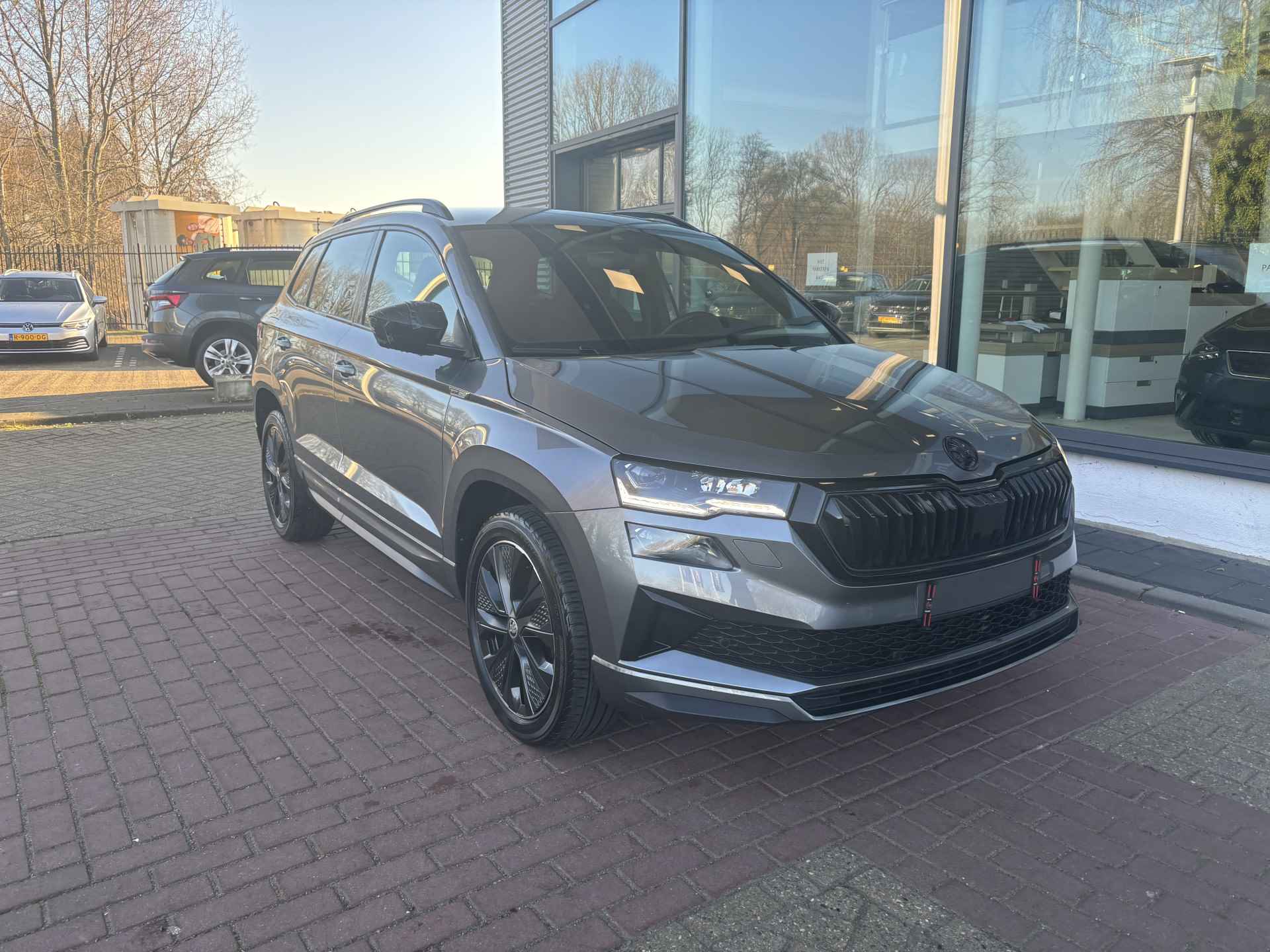 Škoda Karoq 1.5 TSI ACT Sportline Business / Afneembare trekhaak / Achteruitrijcamera / 18" lichtmetalen velgen / Virtual Cockpit / Full LED Matrix koplampen - 27/33