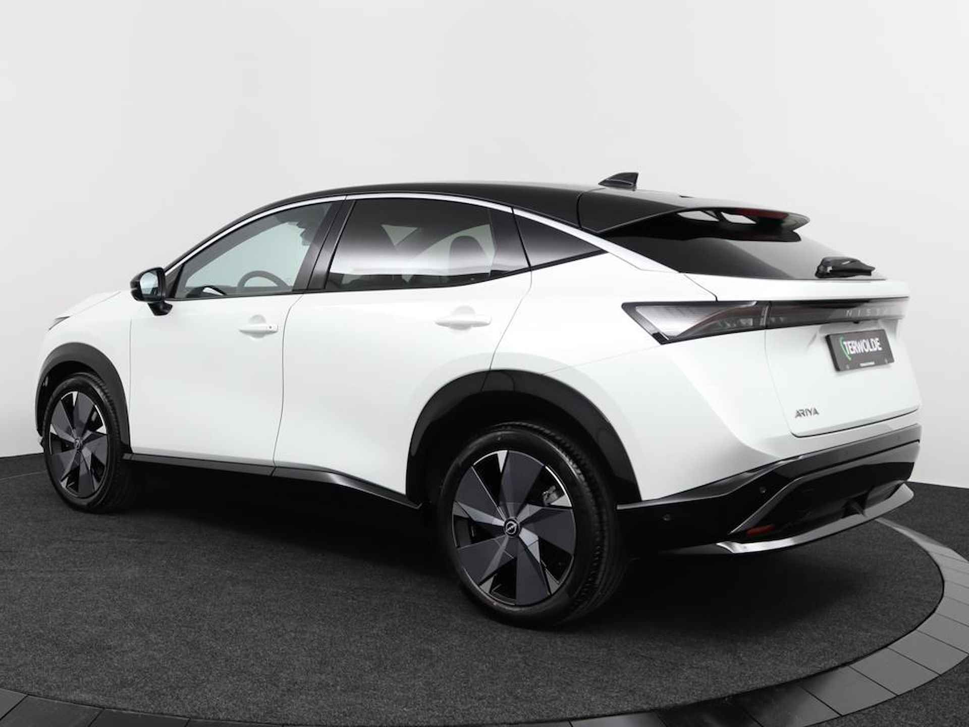 Nissan Ariya Evolve 87 kWh | Kunstlederen/alcantara bekleding | Rondomzicht camera | Draadloos Apple Carplay/ Android Auto | Voor& achter sensoren | Warmtepomp | 120kWh snel laden! | - 7/50