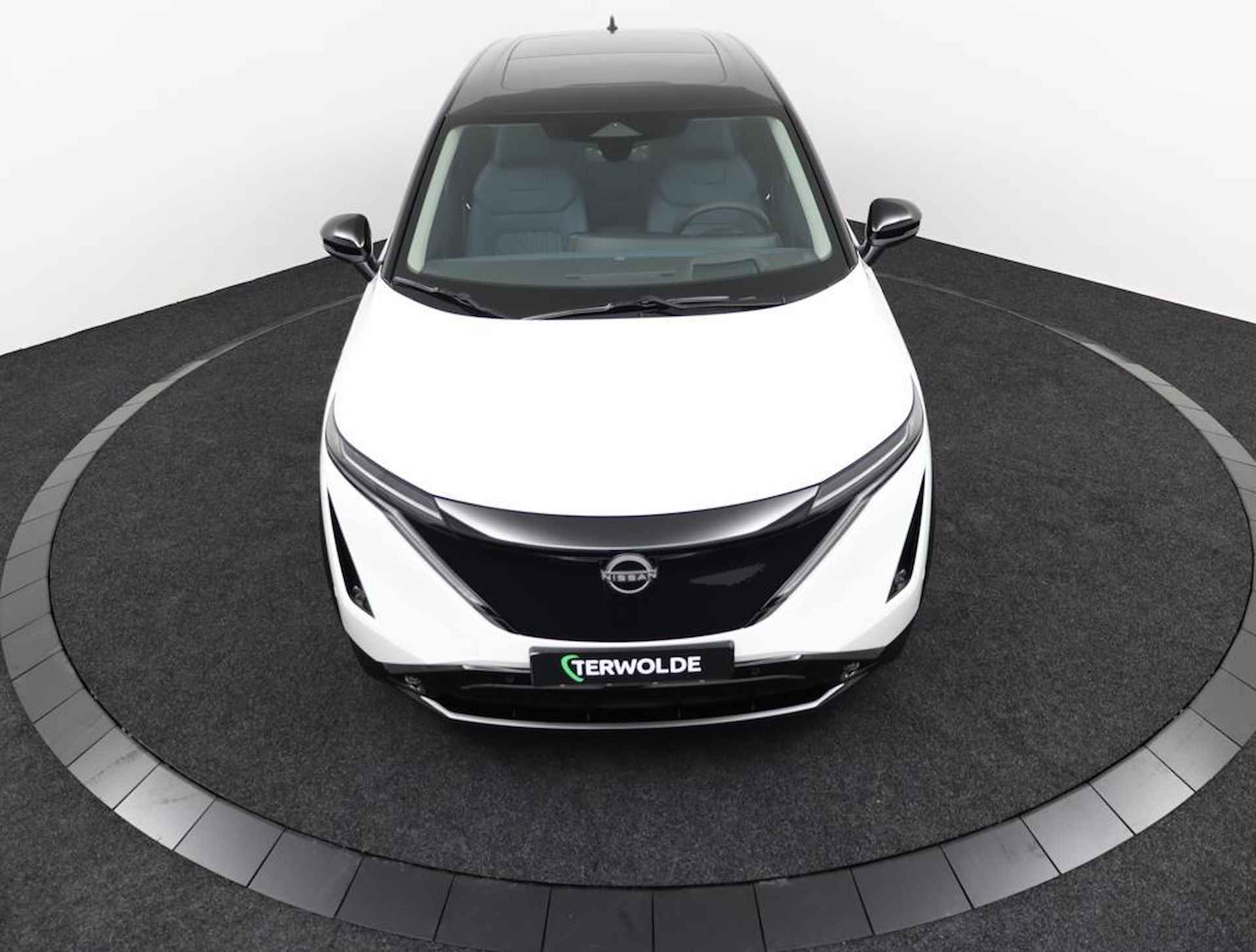 Nissan Ariya Evolve 87 kWh | Kunstlederen/alcantara bekleding | Rondomzicht camera | Draadloos Apple Carplay/ Android Auto | Voor& achter sensoren | Warmtepomp | 120kWh snel laden! | - 9/50