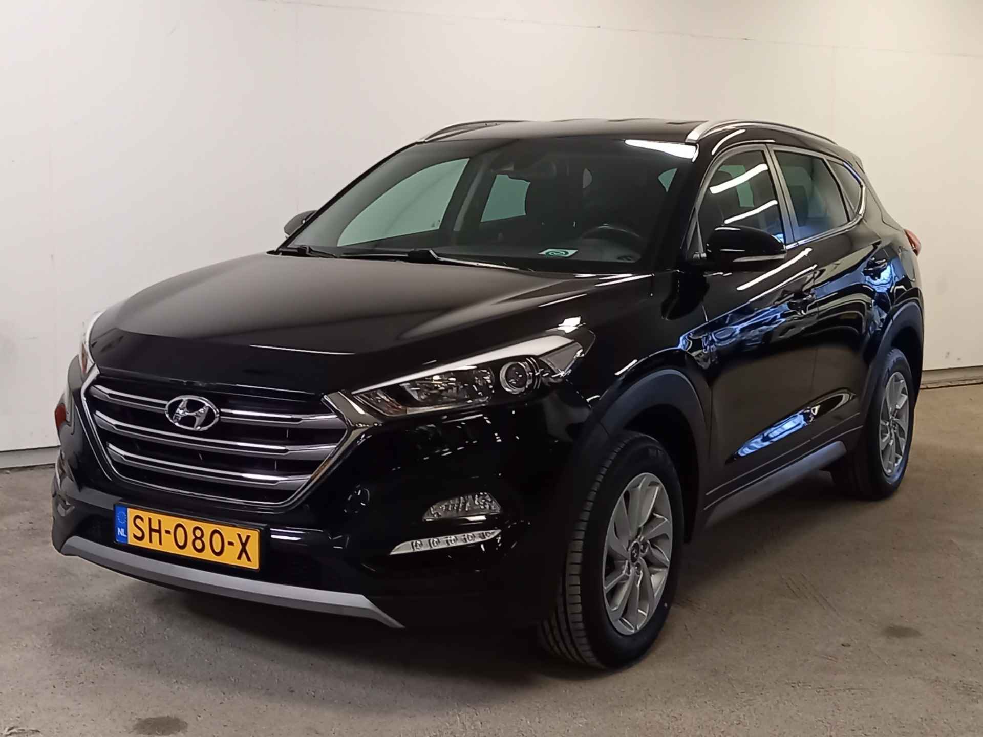 Hyundai Tucson 1.6 GDi Comfort Parkeersensoren voor en achter, stoelverwarming en Apple Carplay, Android Auto - 16/41