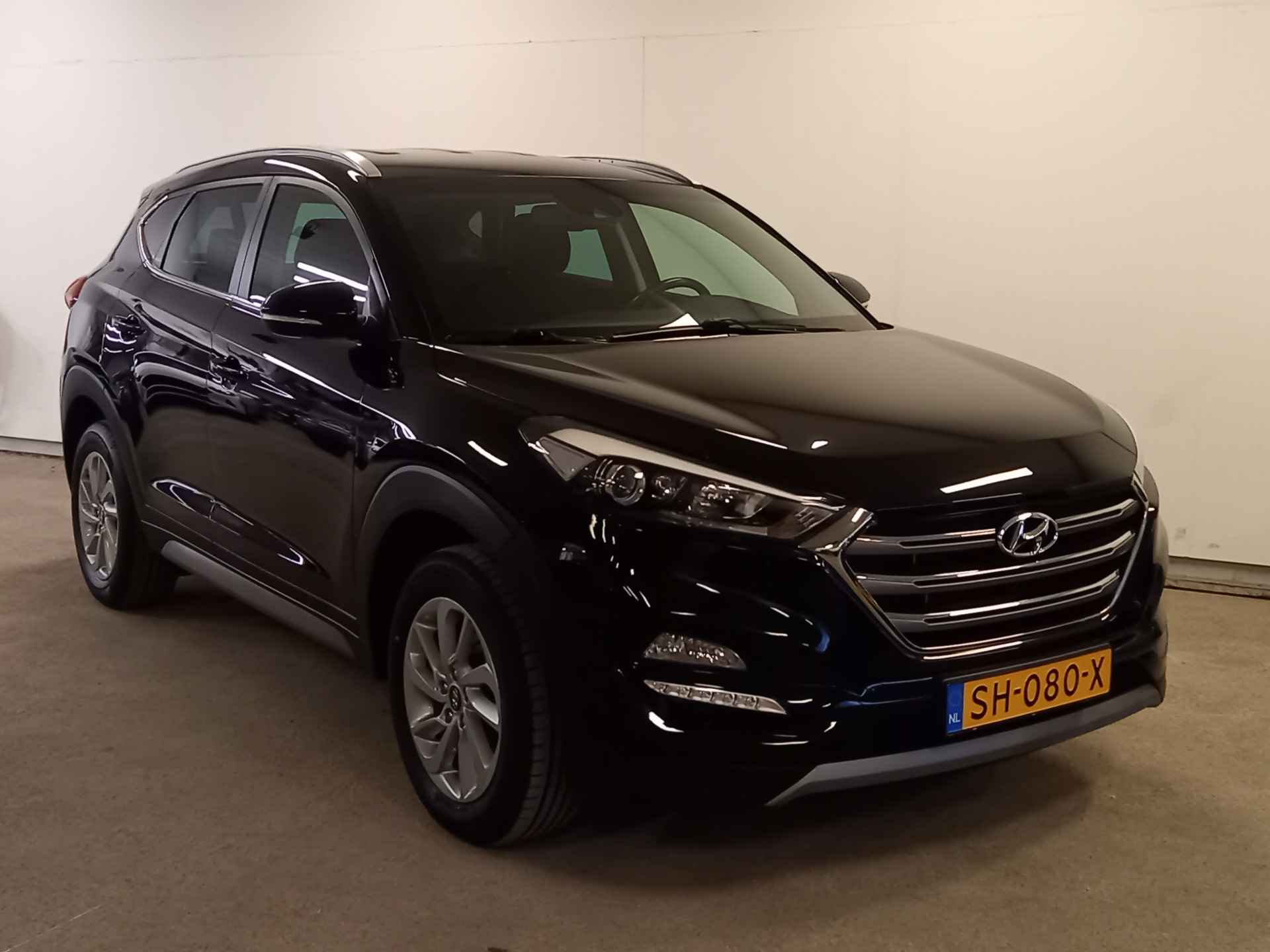 Hyundai Tucson 1.6 GDi Comfort Parkeersensoren voor en achter, stoelverwarming en Apple Carplay, Android Auto - 29/41