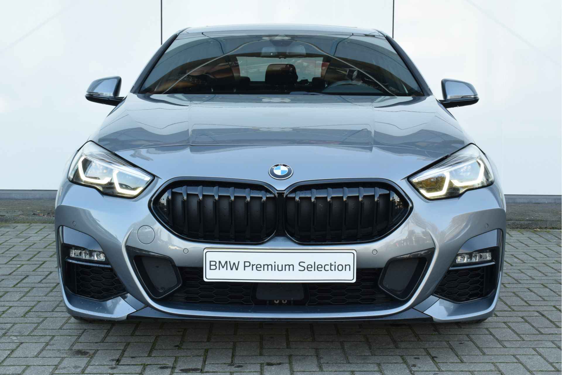 BMW 2 Serie Gran Coupé 218i High Executive M Sport Automaat / Panoramadak / Sportstoelen / Stoelverwarming / Parking Assistant / Live Cockpit Professional / Cruise Control - 7/17