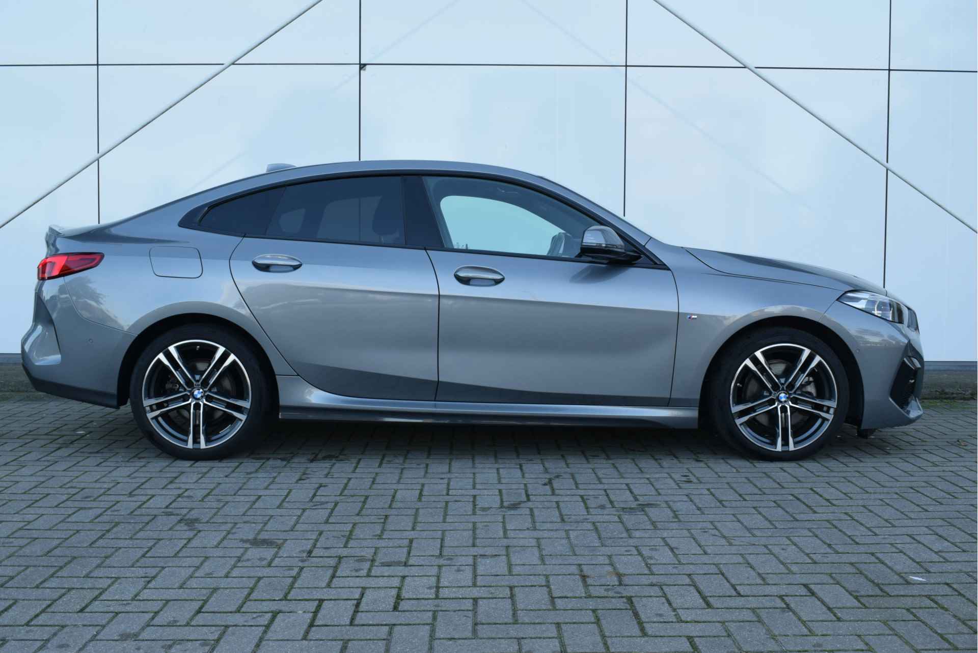 BMW 2 Serie Gran Coupé 218i High Executive M Sport Automaat / Panoramadak / Sportstoelen / Stoelverwarming / Parking Assistant / Live Cockpit Professional / Cruise Control - 10/17