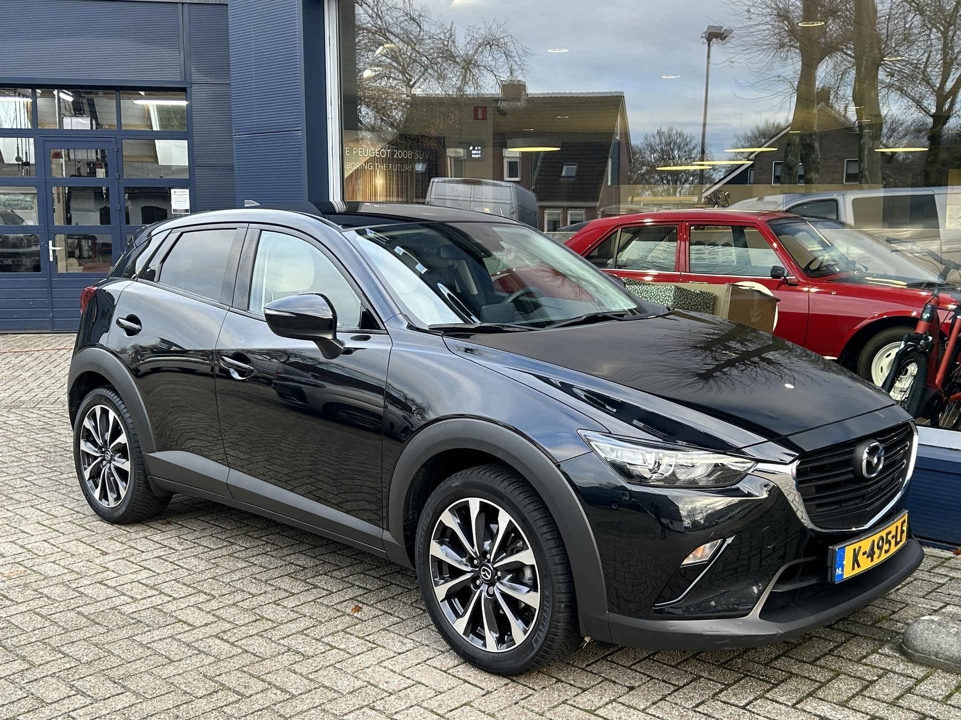 Mazda CX-3 2.0 SkyActiv-G 121 Sportive All Season banden | Navigatie | Lederen bekleding | Parkeersensoren | Lichtmetalen velgen | Stoelverwarming | DAB Radio - 4/48