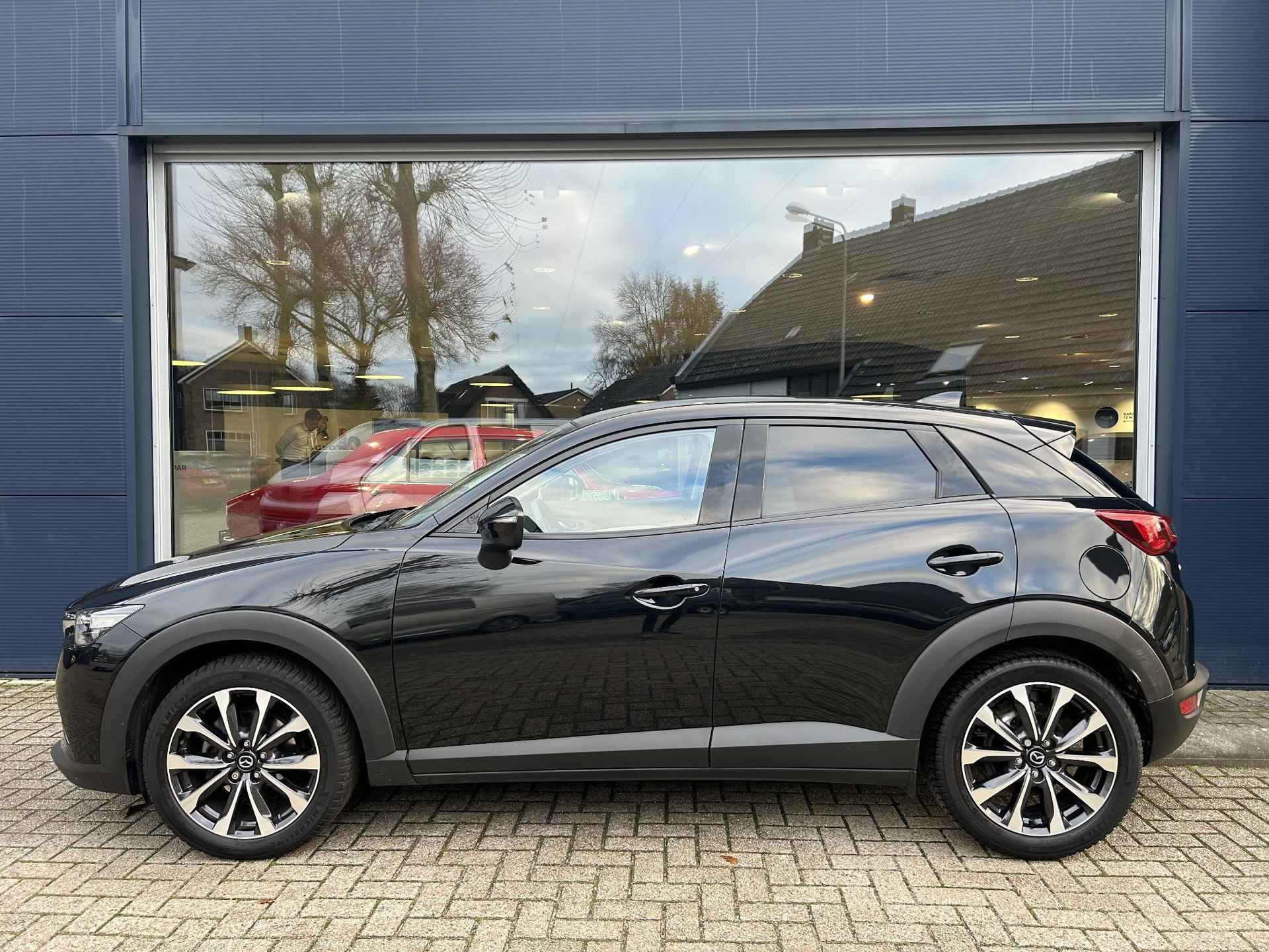 Mazda CX-3 2.0 SkyActiv-G 121 Sportive All Season banden | Navigatie | Lederen bekleding | Parkeersensoren | Lichtmetalen velgen | Stoelverwarming | DAB Radio - 7/48