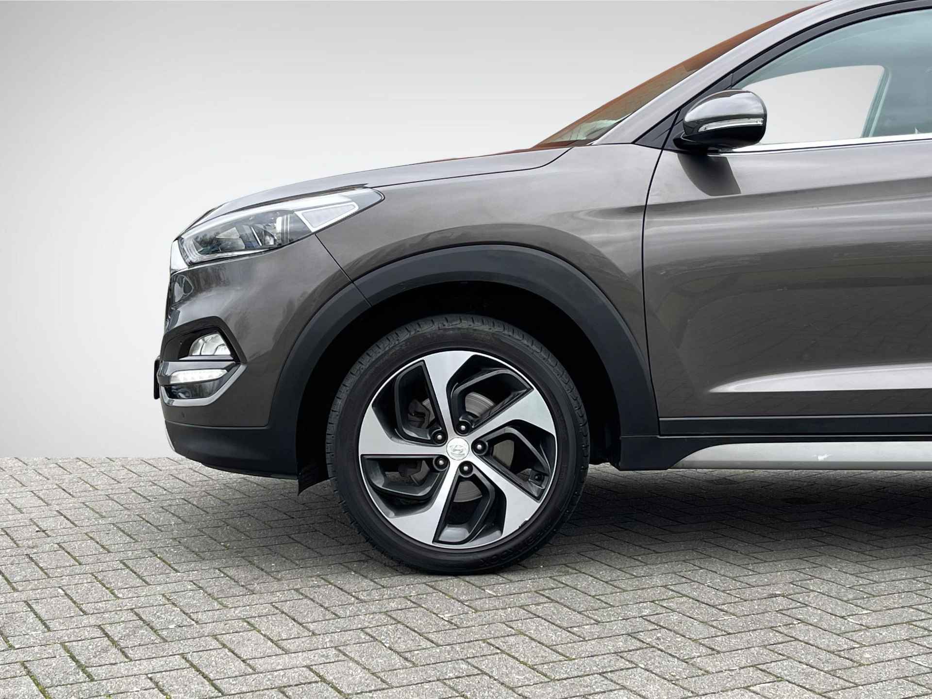 Hyundai Tucson 1.6 GDi Comfort | Trekhaak | Navigatie | Camera | Stoelverwarming | Cruise & Climate Control | 19'' Velgen | Rijklaarprijs! - 8/27