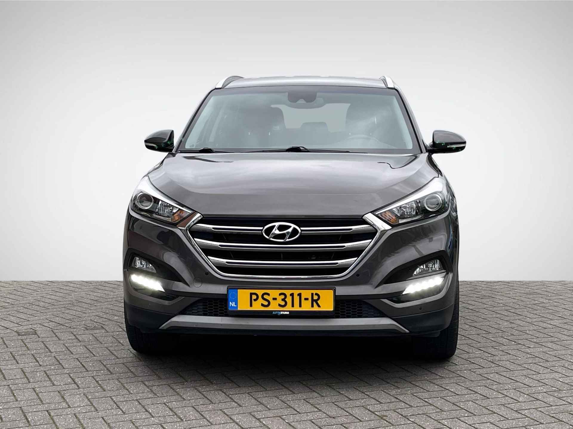 Hyundai Tucson 1.6 GDi Comfort | Trekhaak | Navigatie | Camera | Stoelverwarming | Cruise & Climate Control | 19'' Velgen | Rijklaarprijs! - 2/27