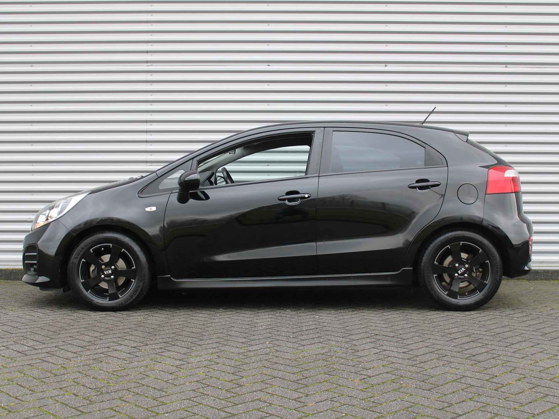 Kia Rio 1.2 CVVT Sportsline | Airco | Cruise | 15" LM | - 8/29