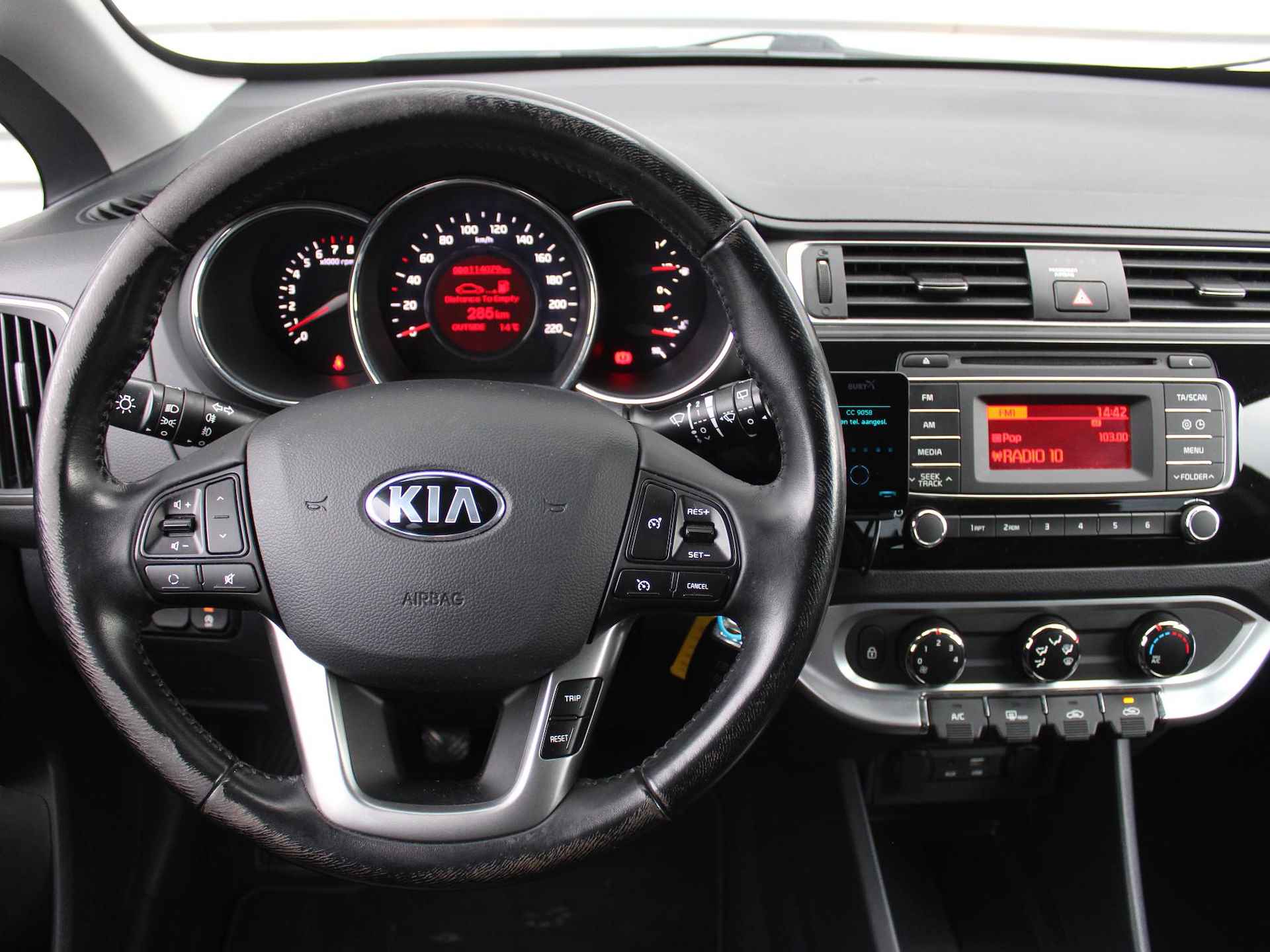 Kia Rio 1.2 CVVT Sportsline | Airco | Cruise | 15" LM | - 10/29