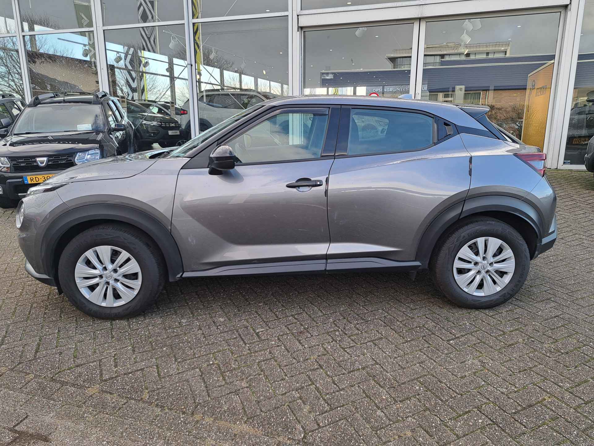 Nissan Juke 1.0 DIG-T 115pk Visia | Airco | Cruise | Bluetooth | | incl. Bovag rijklaarpakket met 12 maanden garantie | - 7/21