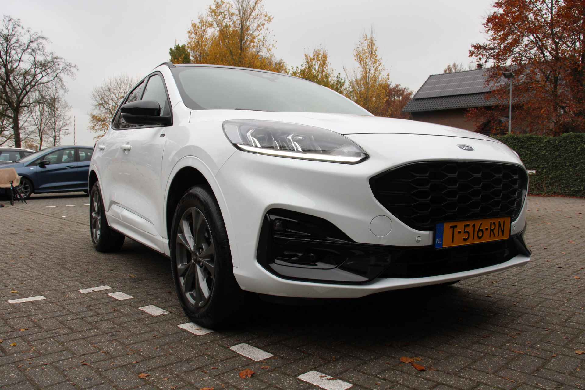 Ford Kuga 2.5 PHEV ST-LINE | BLACK PACK | NL-AUTO! | CAMERA | STANDVERWARMING | NAVI | CLIMA | CRUISE | PARKEERSENSOREN | APPLE CARPLAY & - 7/43