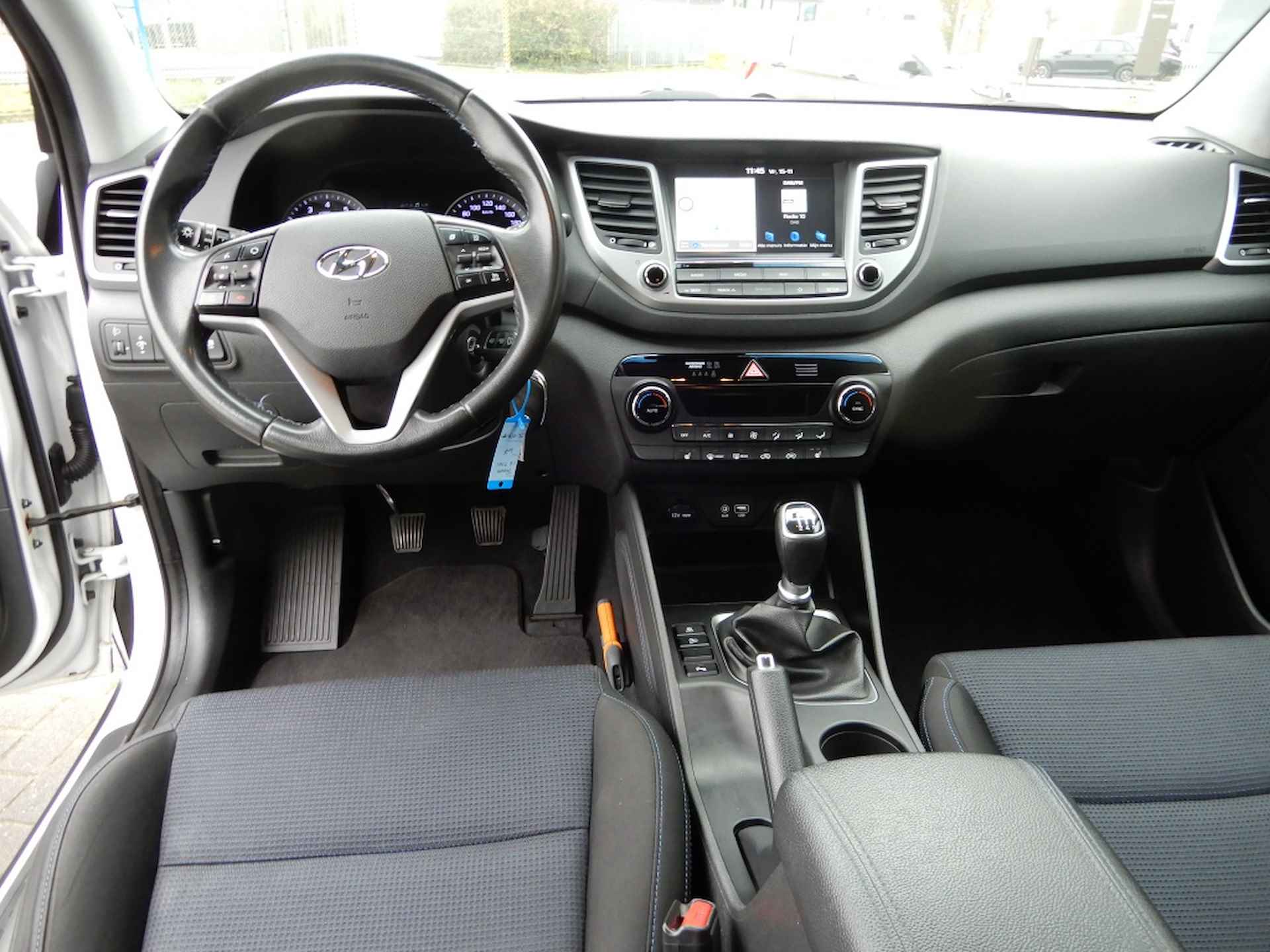 Hyundai Tucson 1.6 T-GDi 177 pk Comfort | Navigatie | Trekhaak 1900kg! | Comple - 18/25