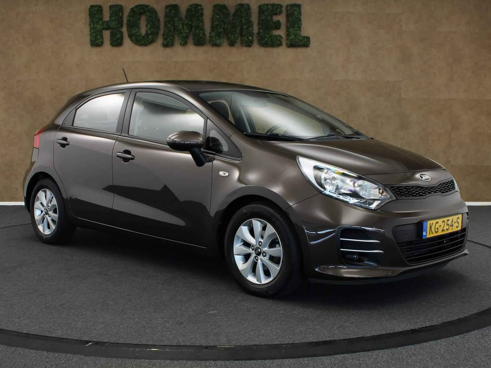 Kia Rio 1.2 CVVT ComfortPlusLine Navigator - ORIGINEEL NEDERLANDSE AUTO - AFNEEMBARE TREKHAAK - TREKGEWICHT 900 KG - CRUISE CONTROL - NAVIGATIESYSTEEM FULL-MAP - ACHTERRUITRIJCAMERA - BLUETOOTH TELEFOONVOORBEREIDING - LEDEREN STUURWIEL EN VERSNELLINGSPOOK - 12/36