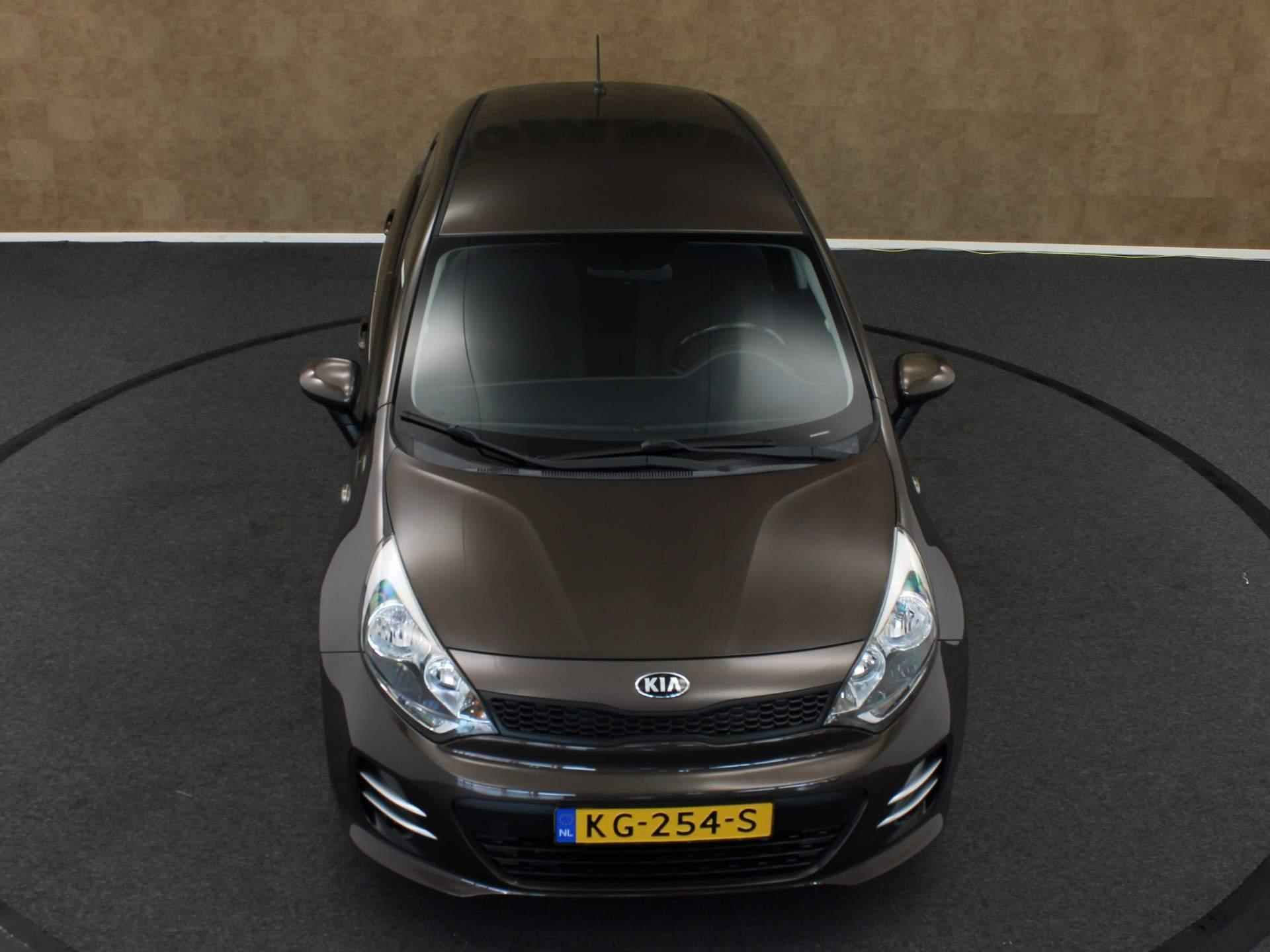 Kia Rio 1.2 CVVT ComfortPlusLine Navigator - ORIGINEEL NEDERLANDSE AUTO - AFNEEMBARE TREKHAAK - TREKGEWICHT 900 KG - CRUISE CONTROL - NAVIGATIESYSTEEM FULL-MAP - ACHTERRUITRIJCAMERA - BLUETOOTH TELEFOONVOORBEREIDING - LEDEREN STUURWIEL EN VERSNELLINGSPOOK - 14/36