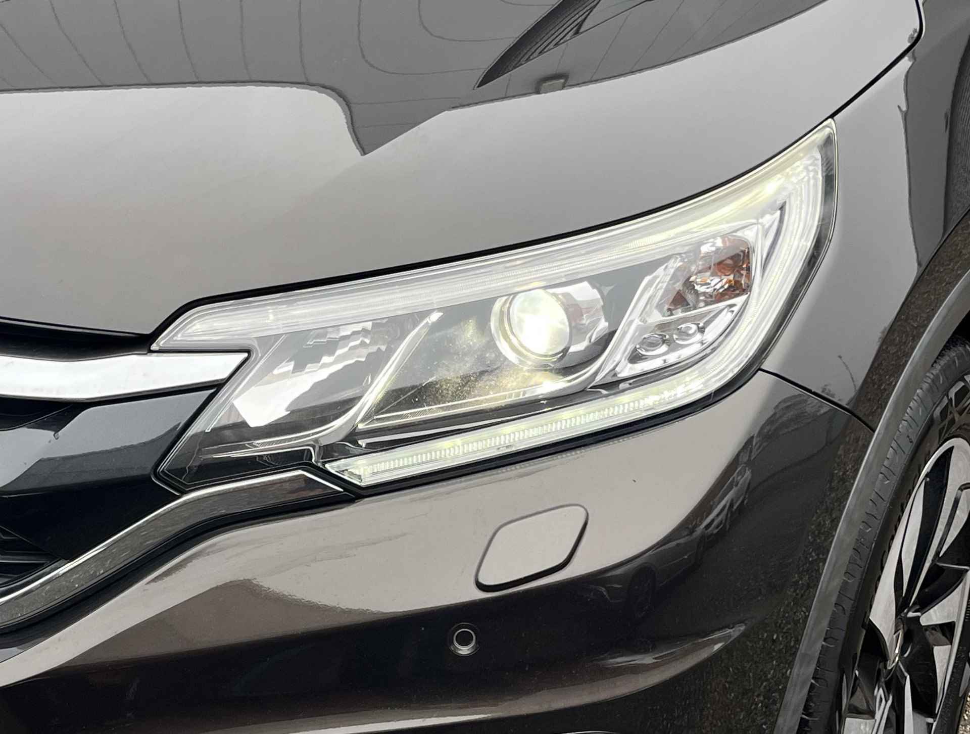 Honda CR-V 2.0 4WD Executive Panoramadak / Climate control / Cruise Control / Parkeercamera / Parkeersensors / Lederen bekleding / DAB / Stoelverwarming voor / Xenon koplampen - 15/32