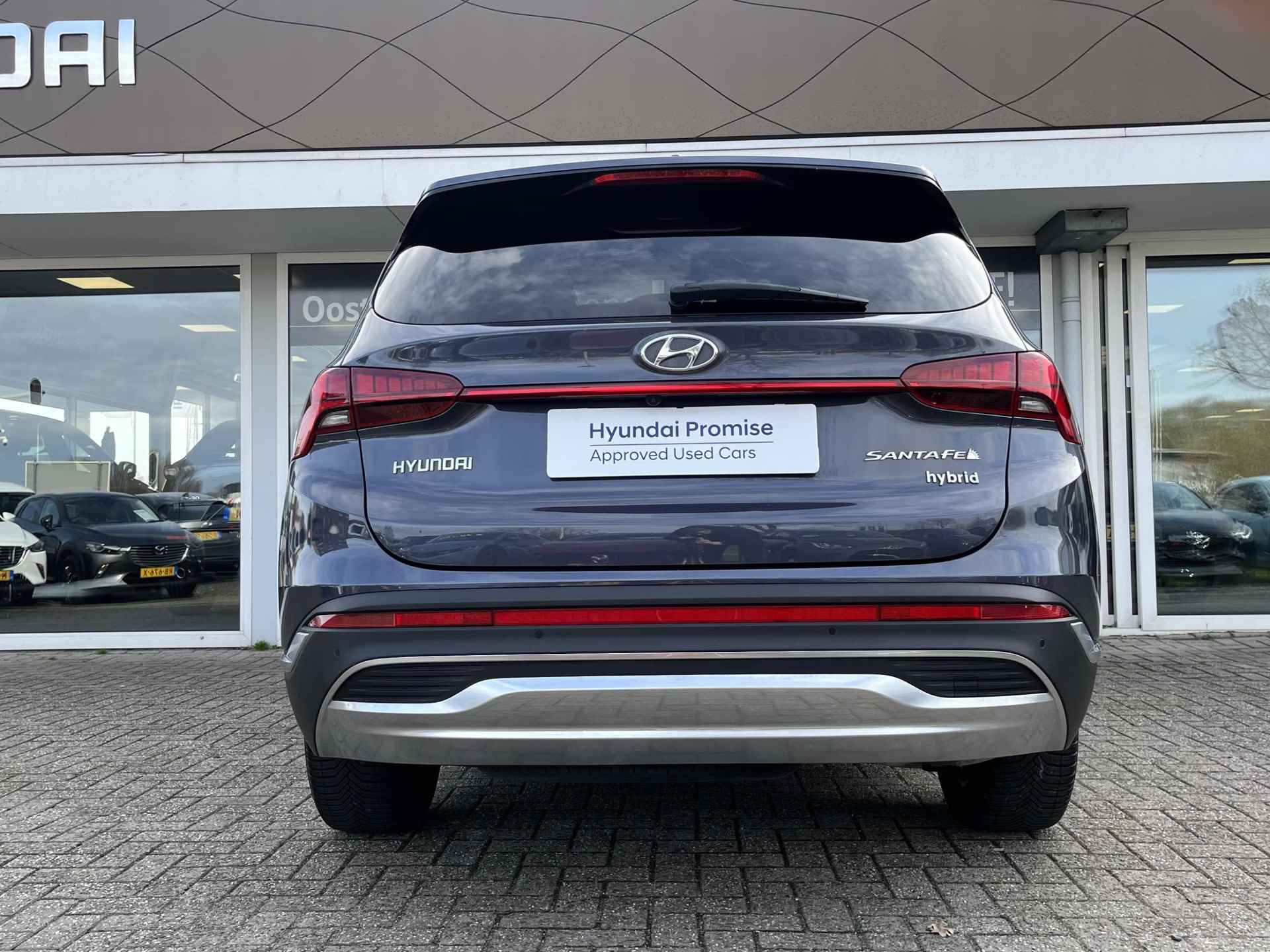 Hyundai Santa Fe 1.6 T-GDI HEV Premium Sky 7p. | Automaat | 7Persoons | 4X4 | Navigatie | Cruise Control Adaptief | Climate Control | Parkeersensoren | Parkeercamera | Schuif/kanteldak | 36Mnd. Garantie | Rijklaar! | - 5/35