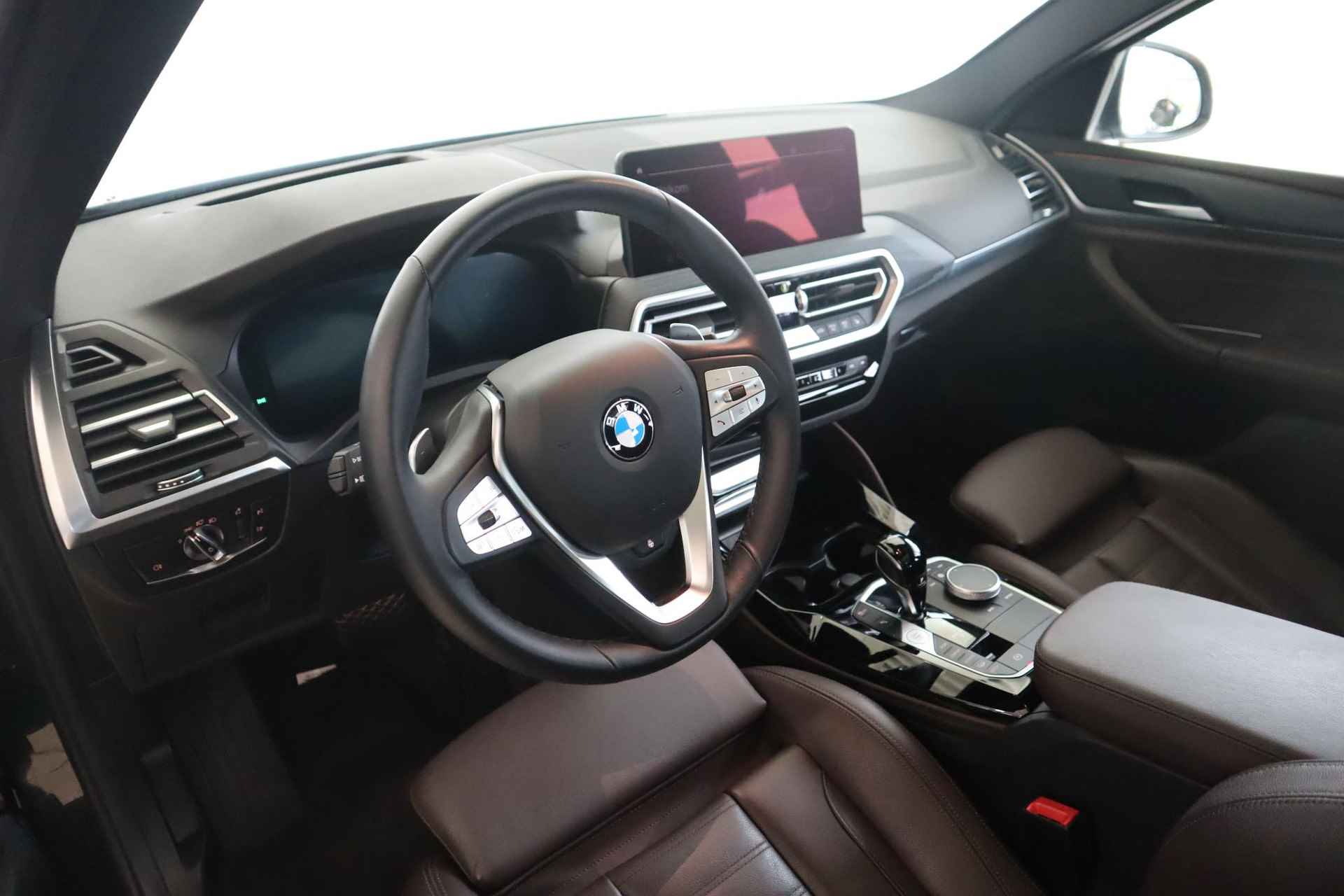 BMW X4 xDrive20i Business Edition Plus / Panoramadak / Stuurwielverwarming / Ambient Air - 12/28