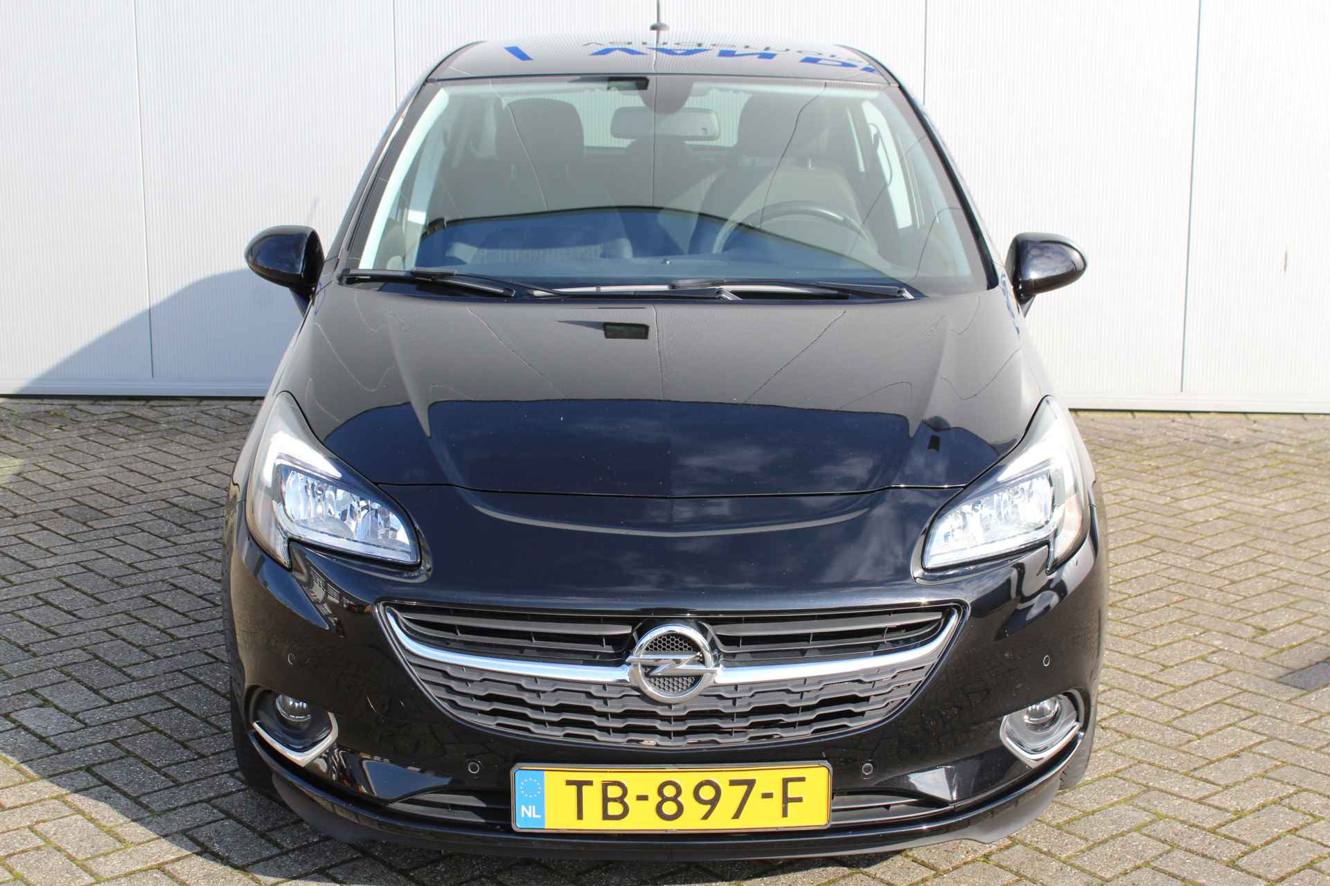 Opel Corsa 1.0-90pk Turbo 'Online Edition'. Erg nette en goed onderhouden Opel Corsa 1.0-90pk Turbo 5drs.. Volautm. airco, cruise control, navigatie, trekhaak afneembare kogel, metallic lak, parkeersensoren v+a, LM wielen, telefoonvoorb., 5 deuren etc. - 4/45