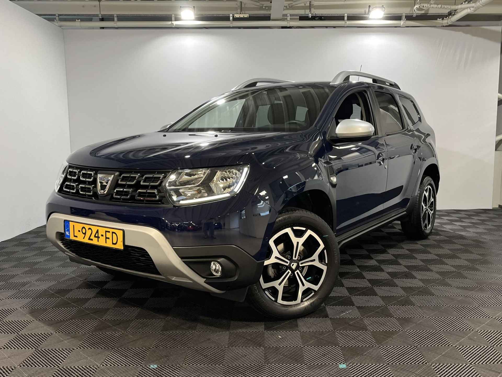 Dacia Duster 1.3 TCe Prestige | Camera | Cruise Control | Bluetooth | Apple Carplay & Android Auto | Lichtmetalen Velgen | - 2/33