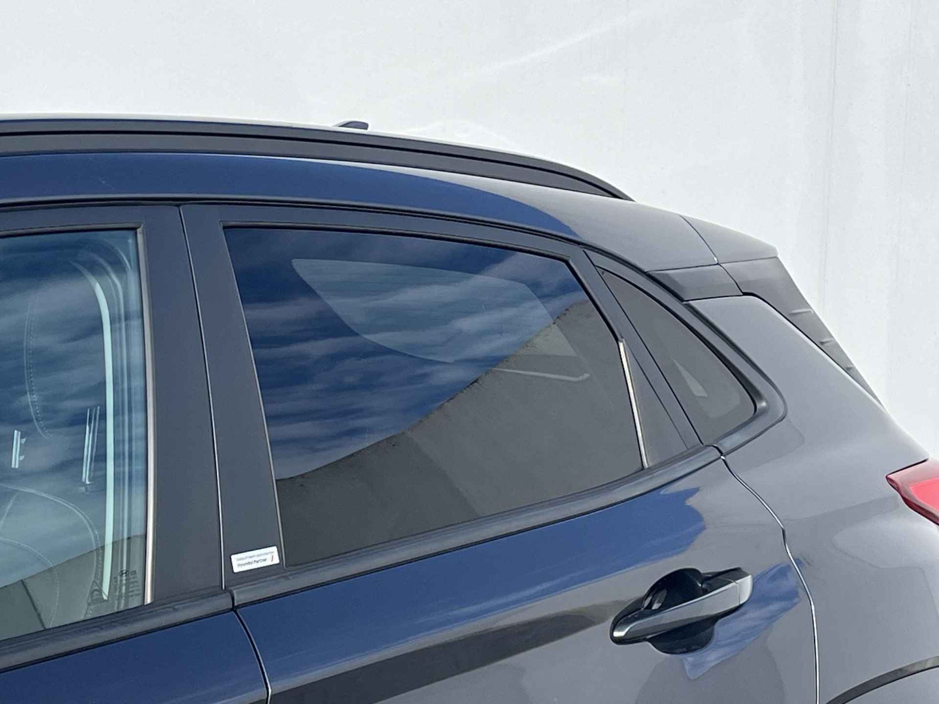 Hyundai Kona EV Premium 64 kWh / €2.000,- Subsidie Mogelijk / 3 Fase laden / Adaptieve cruise control / Stoelverwarming & Stoelventilatie - 31/54