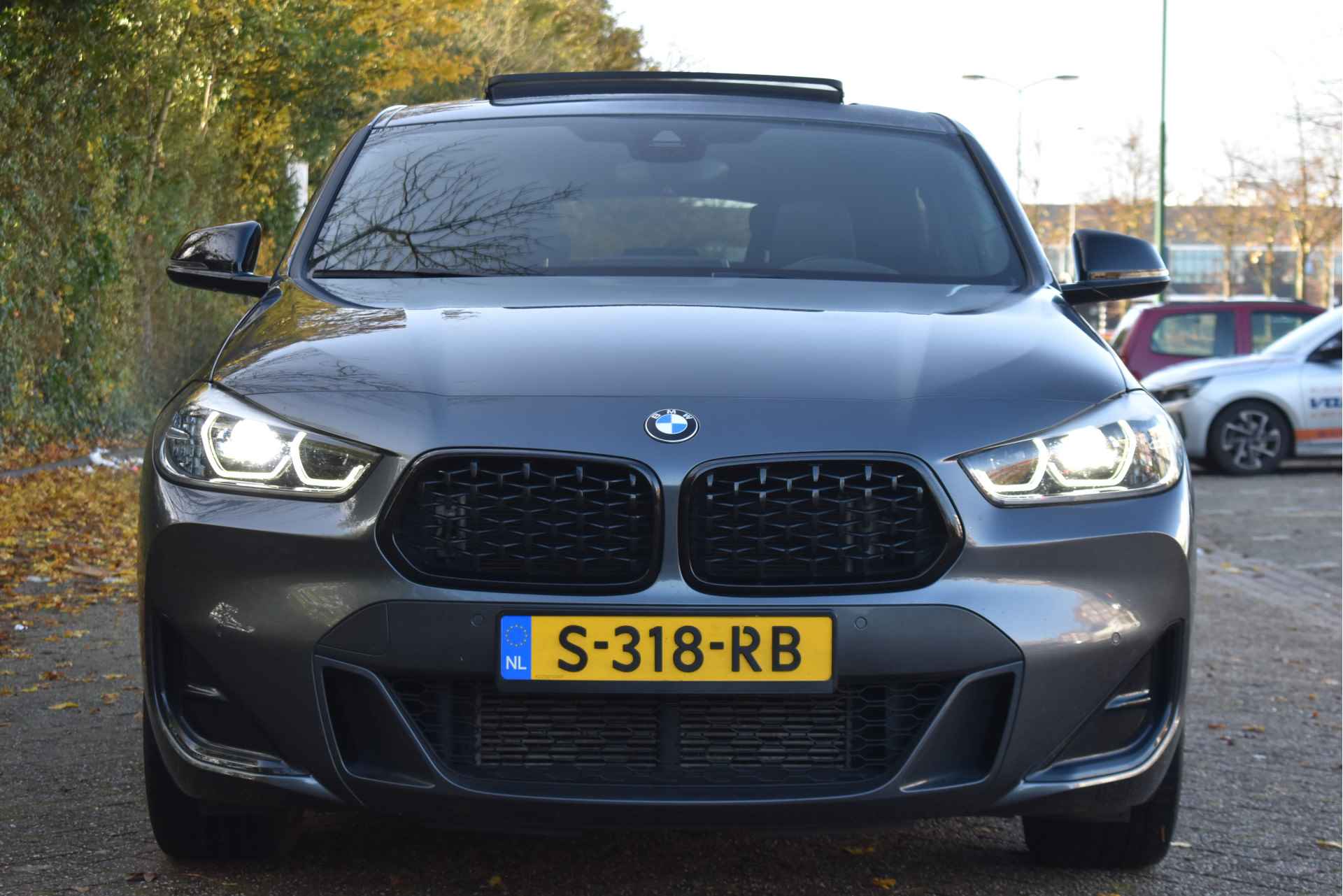 BMW X2 M35i Business Edition Plus 306 PK | Open dak | Camera | Headup | Full LED | Sfeerverlichting | Onderh.historie - 6/82