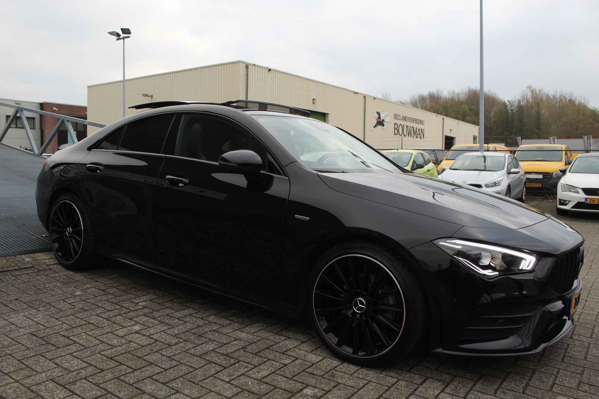 Mercedes-Benz CLA-Klasse 200 AMG Night edition Automaat Panoramadak/Sfeerverlichting/Apple&Android Carplay/Navigatie/Achteruitrijcamera - 10/35