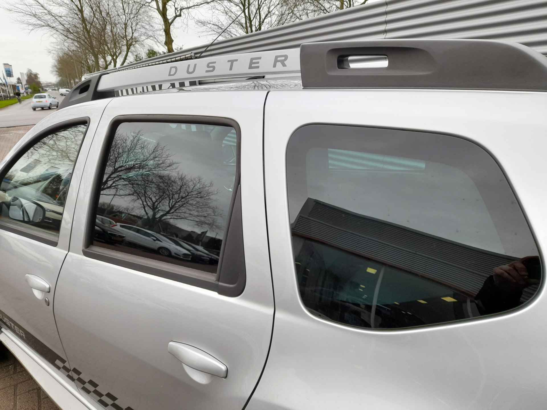 Dacia Duster 1.2 TCe 4x2 Prestige | Airco | Cruise control | Trekhaak | PDC | Navigatie | Lederen bekeleding | RIJKLAARPRIJS INCL 12 MAANDEN GARANTIE EN BEURT - 12/24