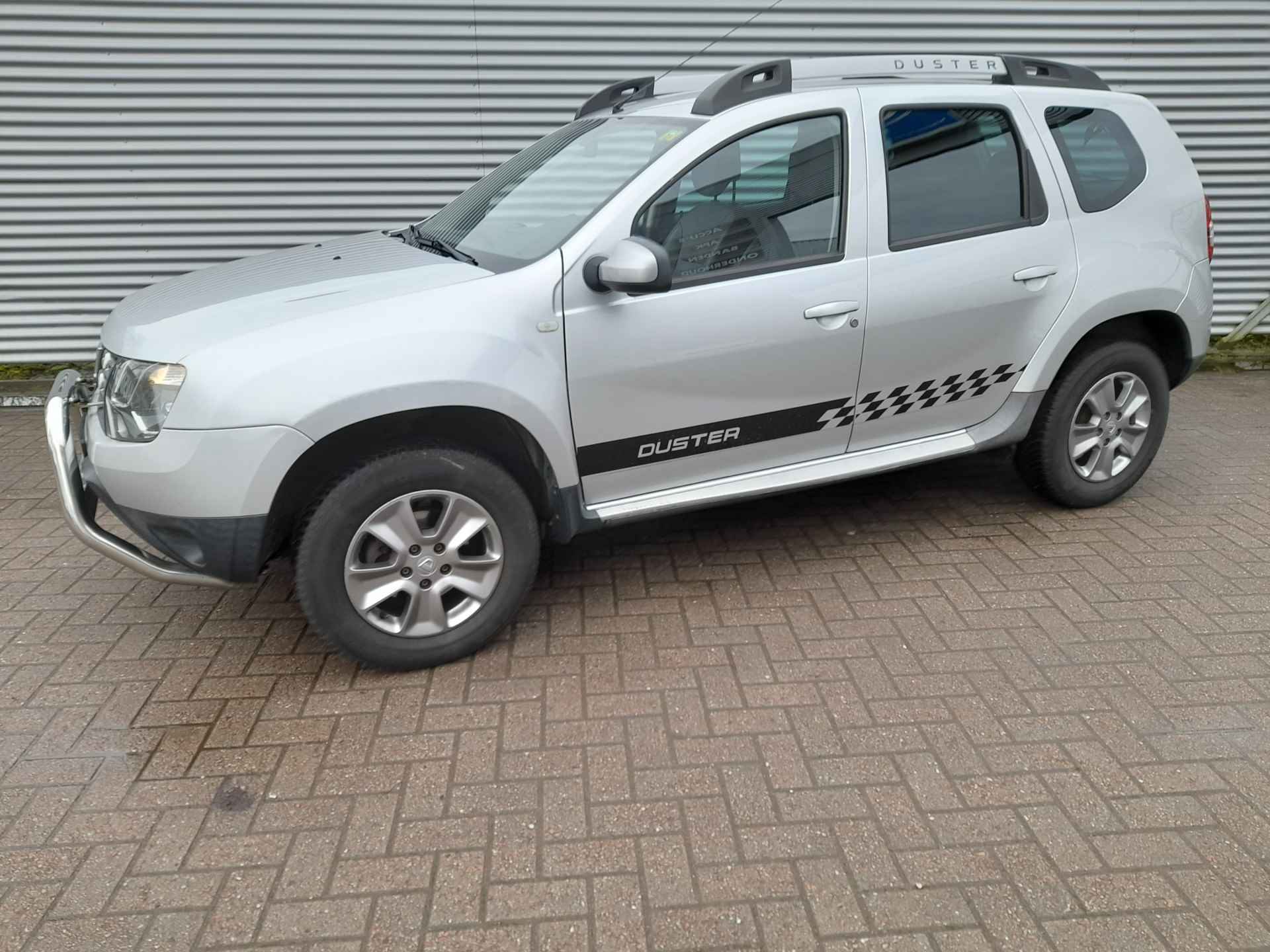 Dacia Duster 1.2 TCe 4x2 Prestige | Airco | Cruise control | Trekhaak | PDC | Navigatie | Lederen bekeleding | RIJKLAARPRIJS INCL 12 MAANDEN GARANTIE EN BEURT - 1/24