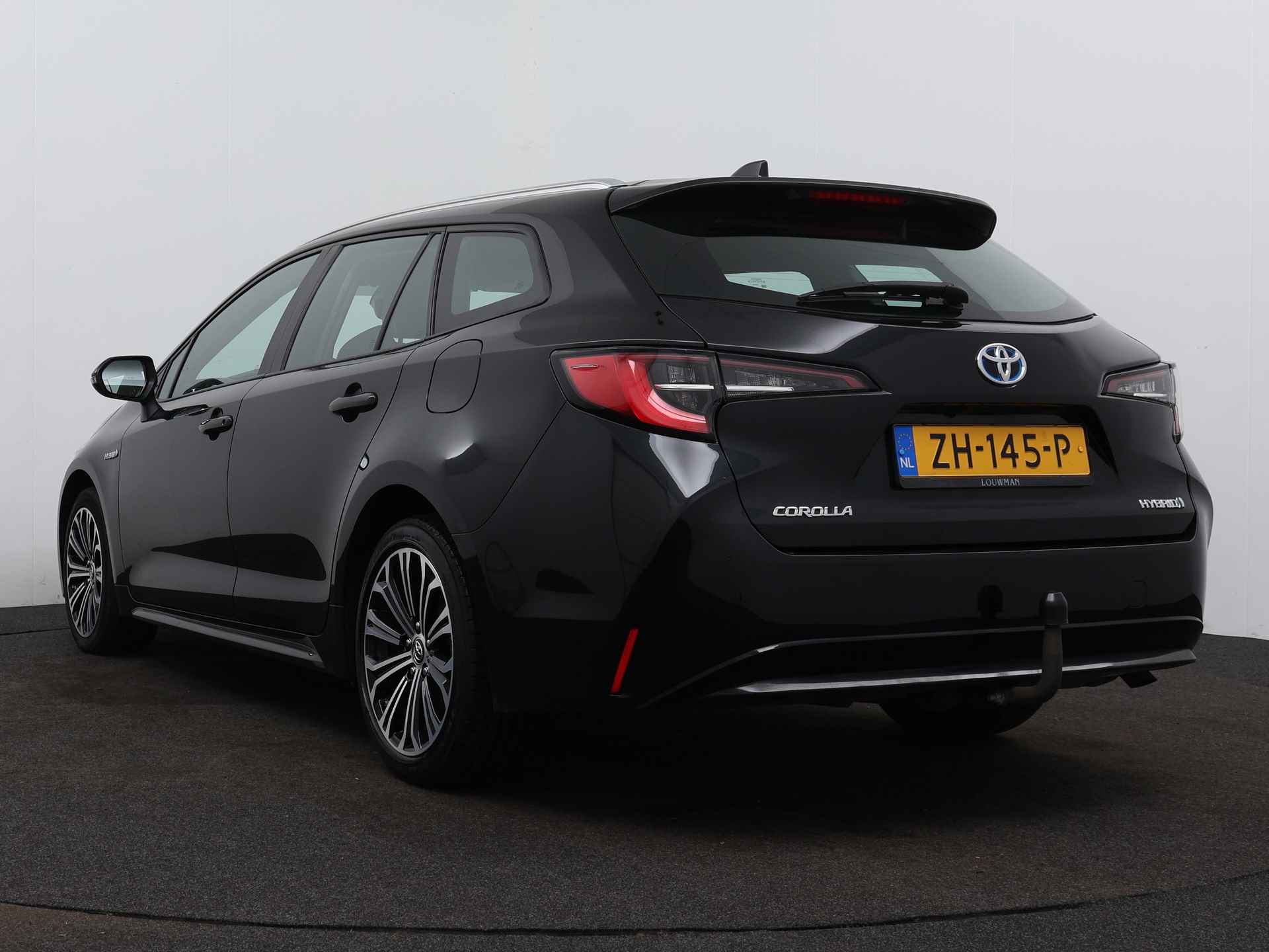 Toyota Corolla Touring Sports 1.8 Hybrid First Edition | Trekhaak | Navigatie | - 16/40