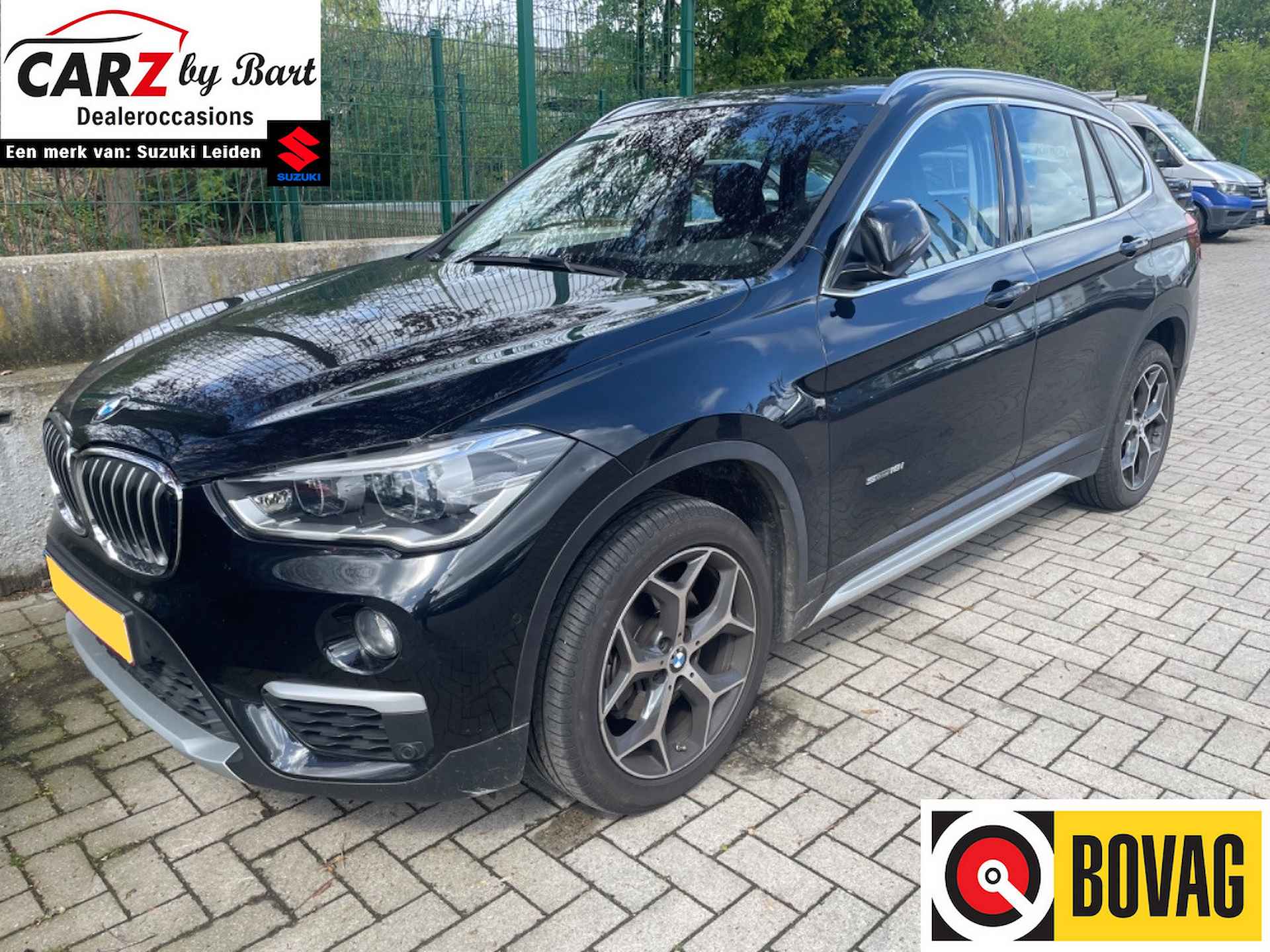 BMW X1 sDRIVE18i CENTENNIAL EXECUTIVE AUT. Leder | Navi | 18" Lichtmetalen velgen - 1/9