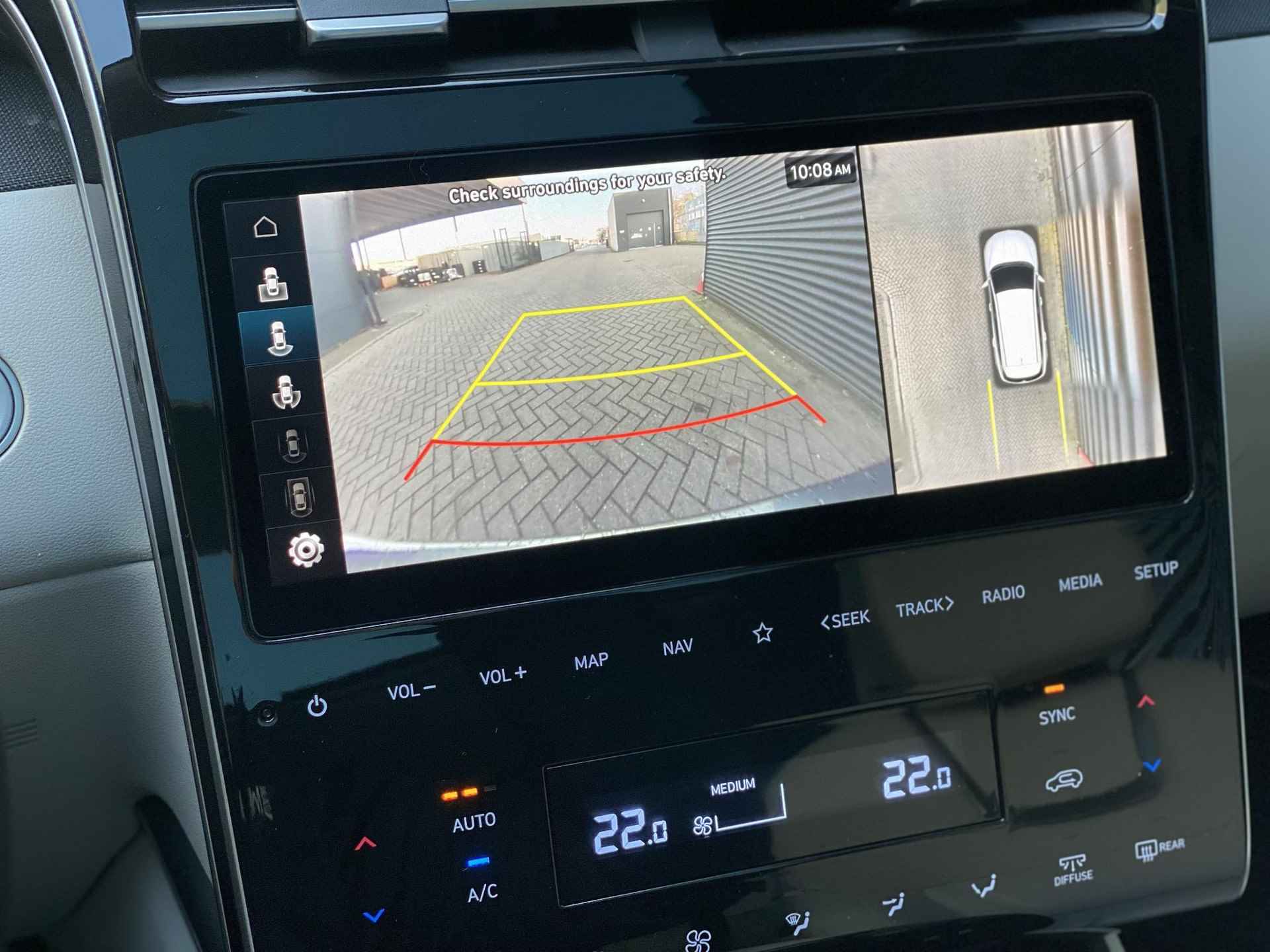 Hyundai Tucson 1.6 T-GDI HEV Premium Sky | Lederen bekleding & verwarming & koeling | Panoramische Schuifkanteldak | Blind spot camera | - 26/42