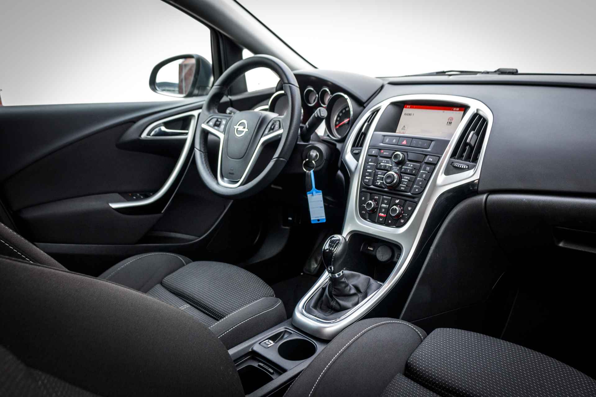 Opel Astra Sports Tourer RIJKLAAR 1 e EIGENAAR 1.4 141 PK Turbo OPC Design Edition Tourer UNIEK ! | Ergo stoelen | Clima | Navigatie | 19 Inch LMV | Pdc Achter | - 4/31