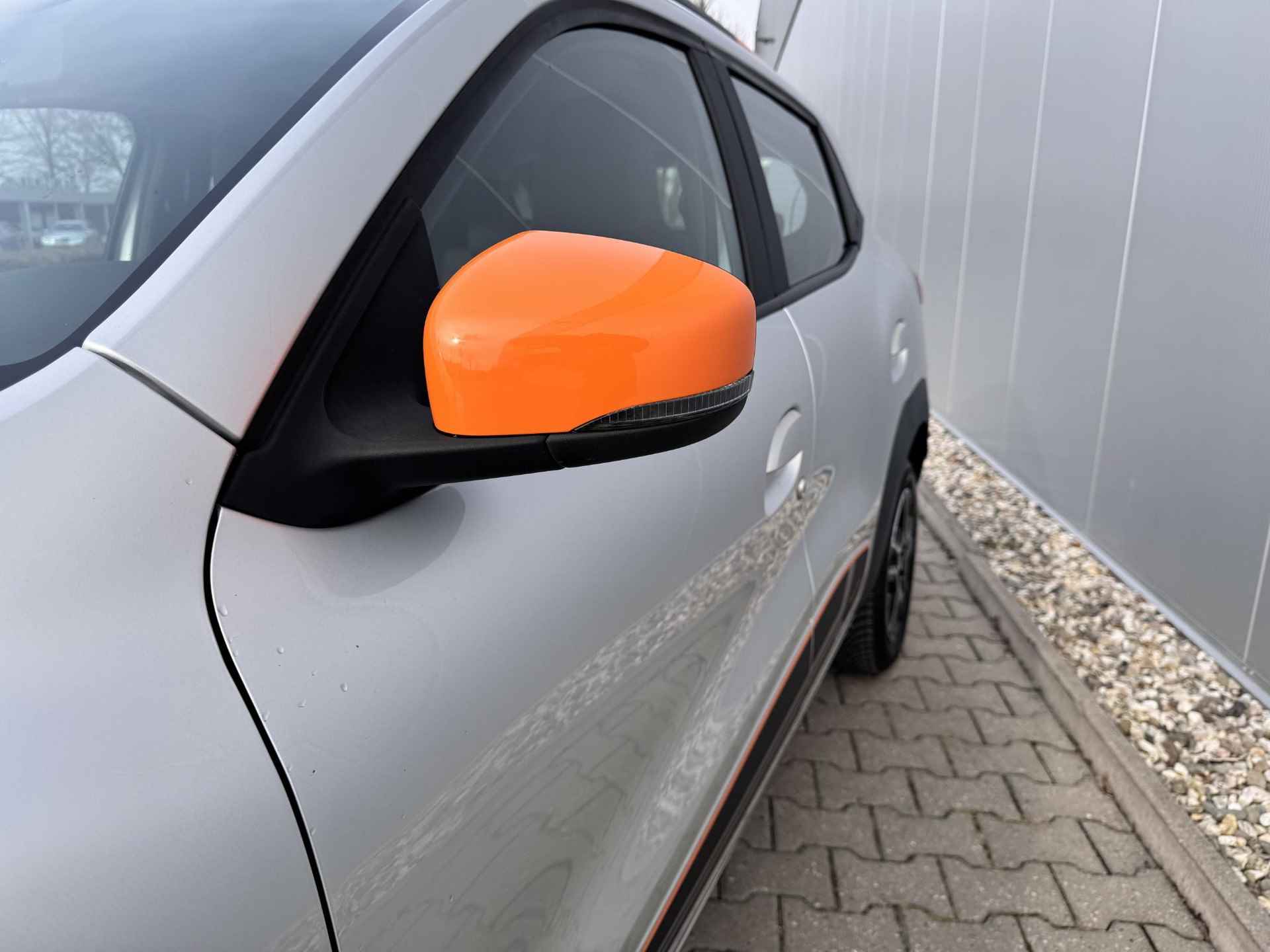 Dacia Spring Comfort Plus (Orange Pack) 27 kWh / Navigatie / Airco / All Season Banden / Bluetooth / Kunstlederen Bekleding / Afneembare trekhaak / - 13/30