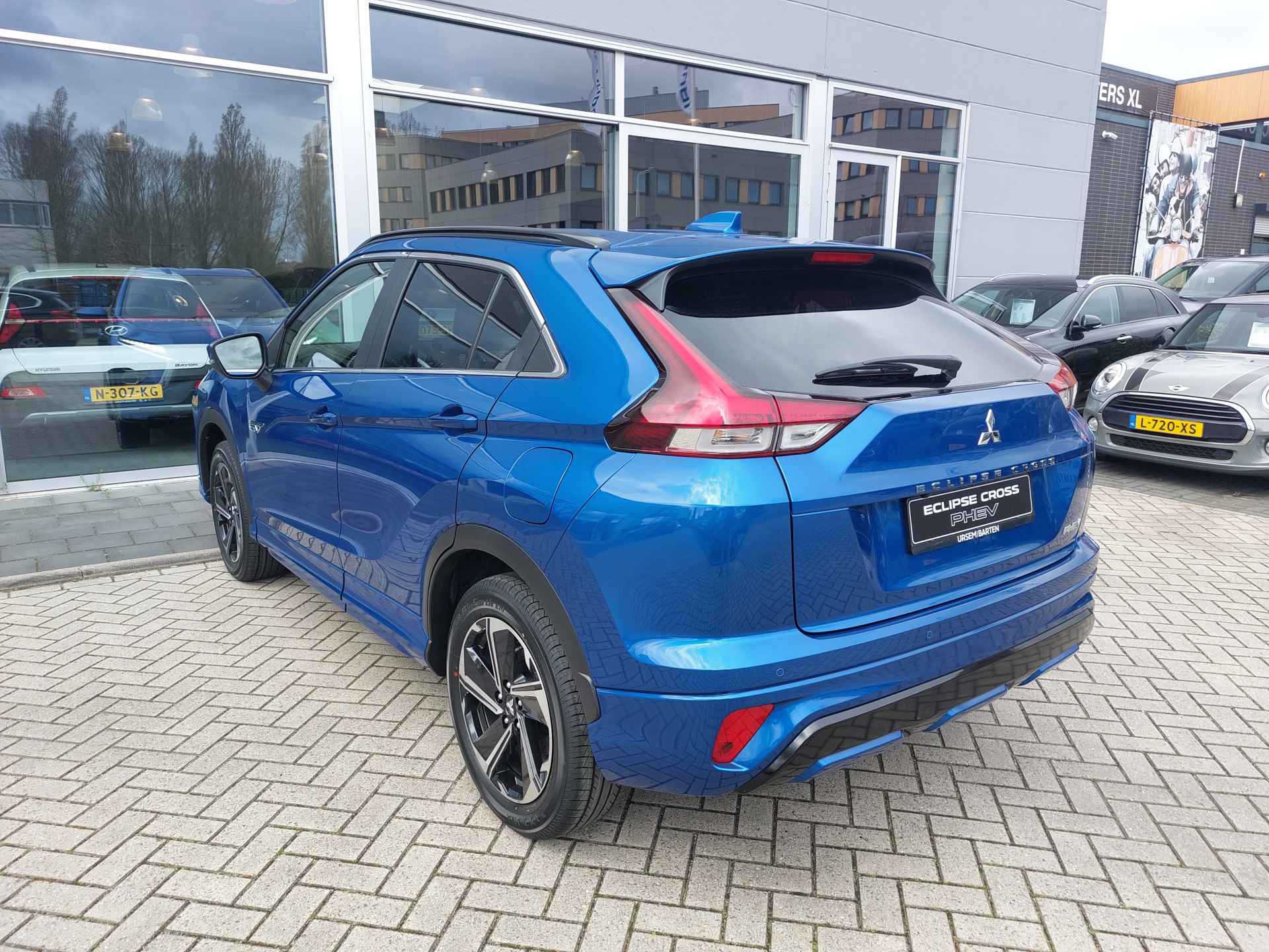 Mitsubishi Eclipse Cross 2.4 PHEV Intense+ Van € 44.990,- nu voor € 35.930 - 5/23