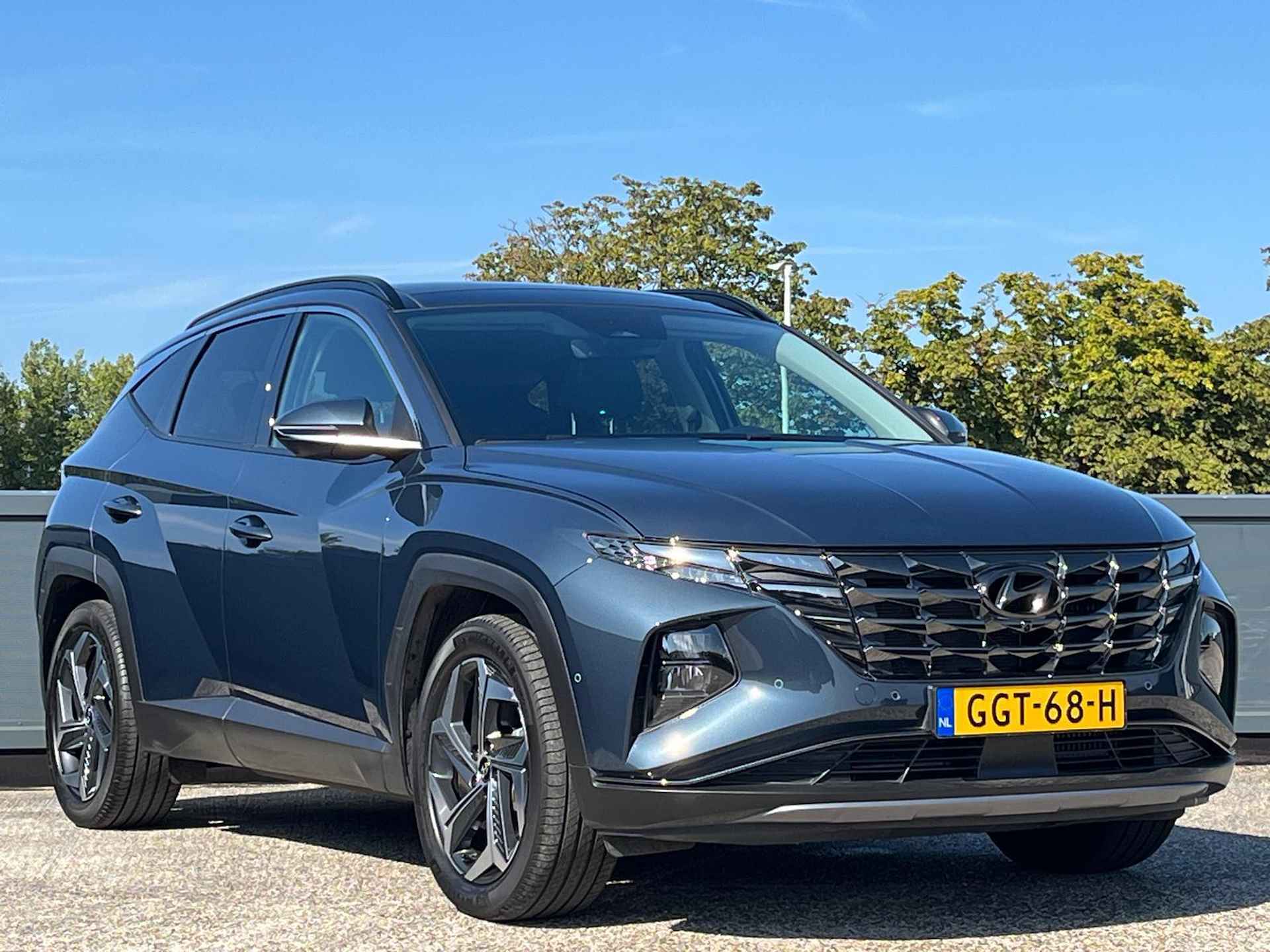 Hyundai Tucson 1.6 T-GDI HEV Premium Sky | Schuifkanteldak | Lederen bekleding | 19'' 2-tone Lmv | Adaptieve cruisecontrol | - 4/41