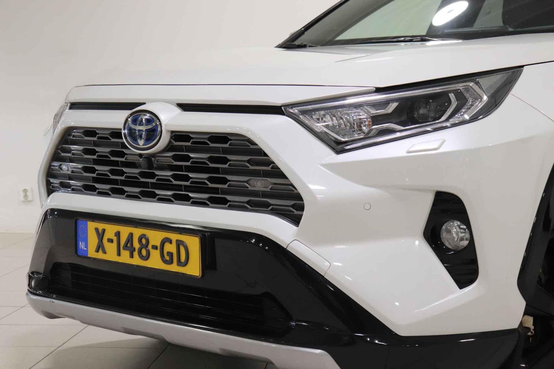 Toyota RAV4 2.5 Hybrid AWD Bi-Tone Limited, Cruise Control, Climate Control, Stoelverwarming, Stuurwielverwarming, Voorruitverwarming bij de Ruitenwissers, Camera 360 graden, JBL, BSM - 26/33