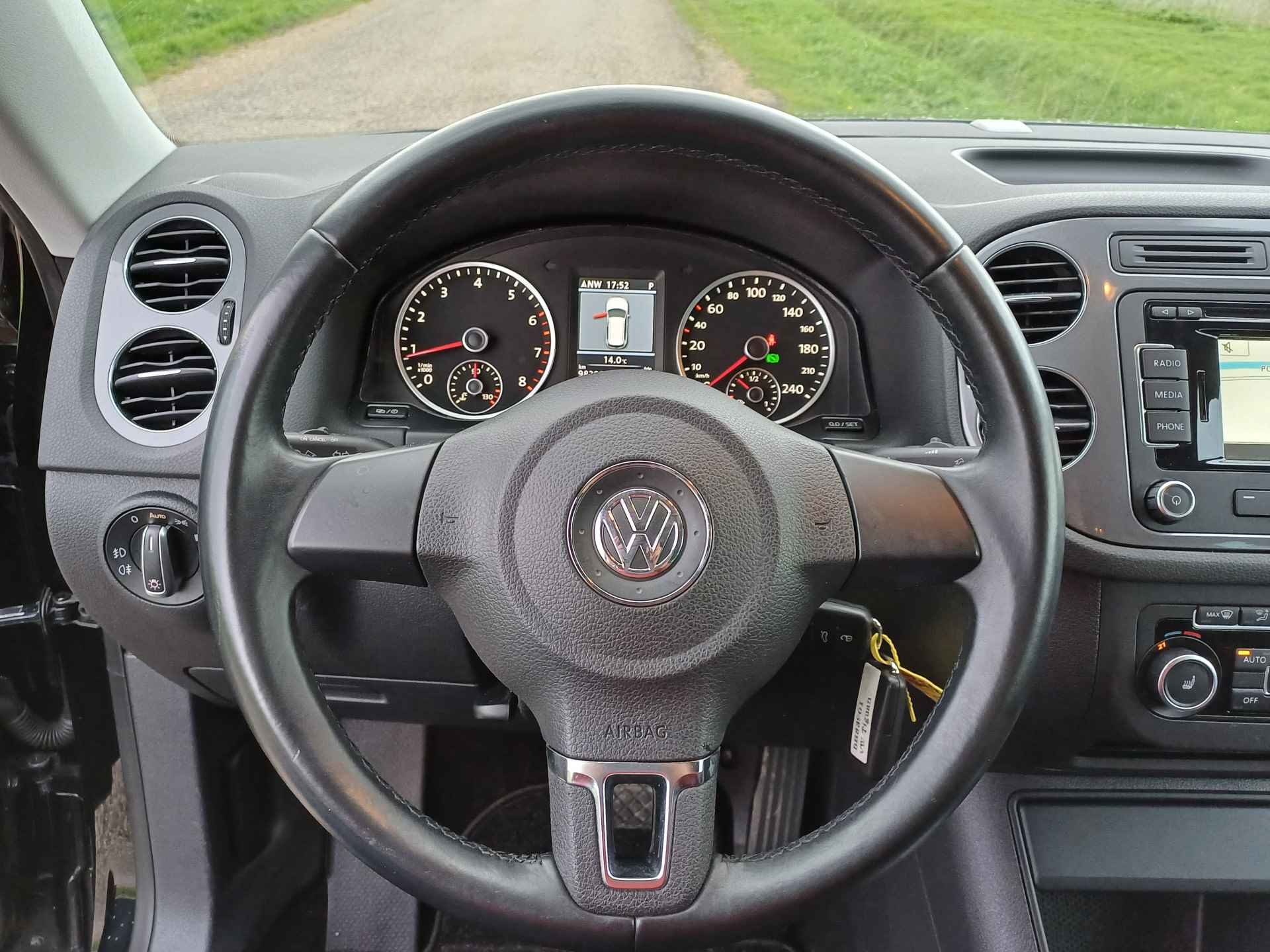 Volkswagen Tiguan 2.0 TSI Sport&Style 4Motion Nette auto | Keurig onderhoud | Navi | Cruise | Parkeerhulp V+A - 32/39