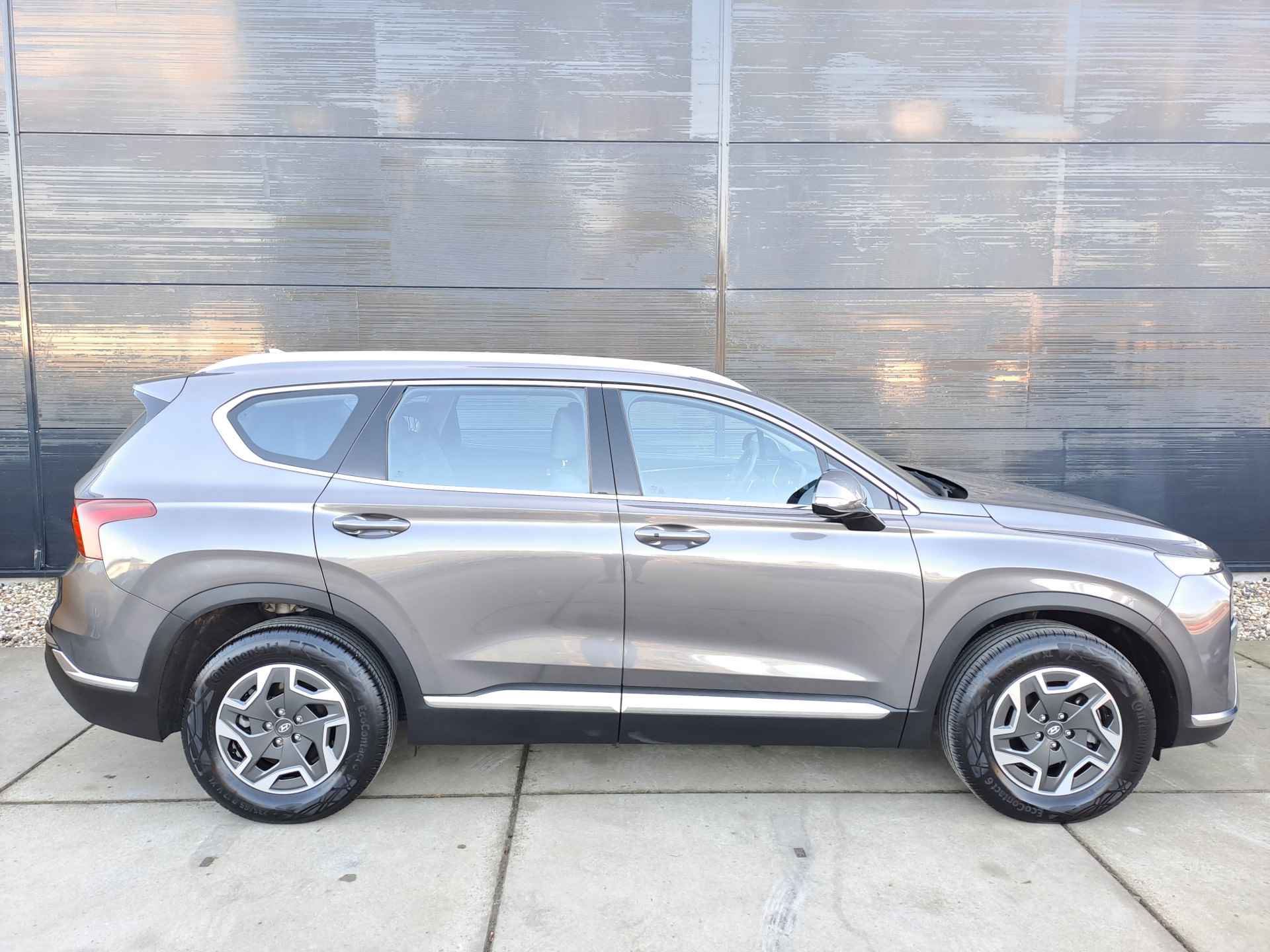 Hyundai Santa Fe 1.6 T-GDI HEV Automaat Comfort 7-persoons |Lederen bekleding | Adaptive cruise control | Stoelverwarming - 15/57