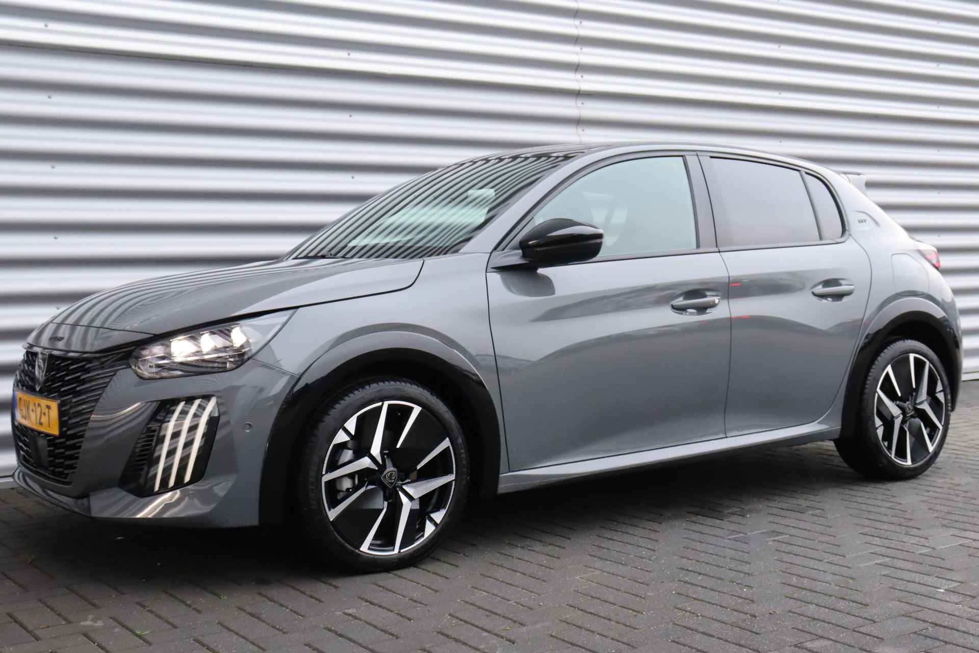 Peugeot 208 HYBRID 100PK GT PACK AUTOMAAT / NAVI / LEDER / CLIMA / PDC / 17" LMV / CAMERA / KEYLESS / PANO. DAK / WINTERPAKKET / ADAPT. CRUI - 6/43