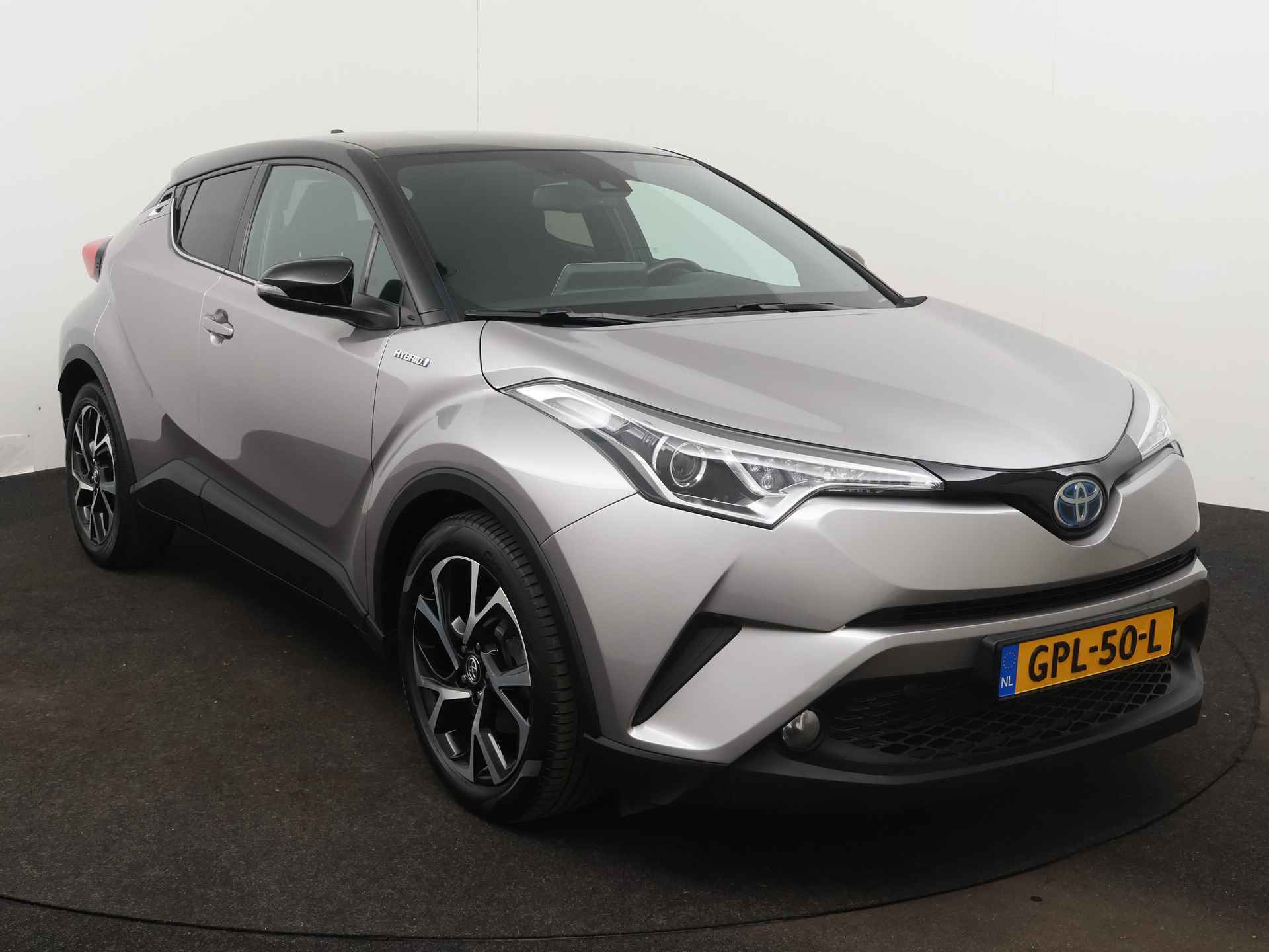 Toyota C-HR 1.8 Hybrid Dynamic Bi-Tone Limited | Camera | Climate Control | LM velgen | Stoelverwarming | - 29/43