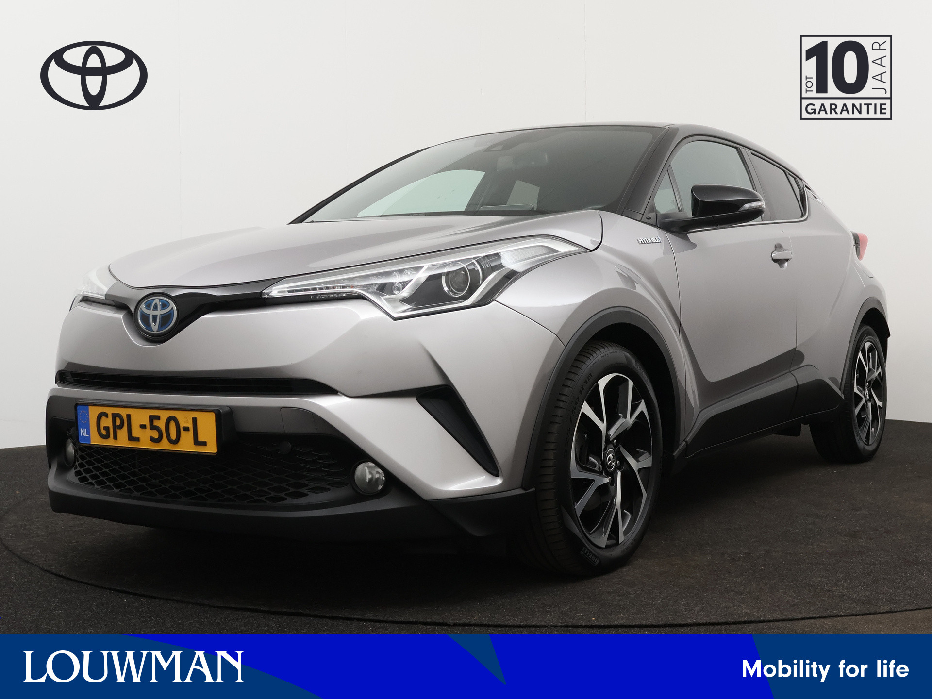 Toyota C-HR 1.8 Hybrid Dynamic Bi-Tone Limited | Camera | Climate Control | LM velgen | Stoelverwarming |