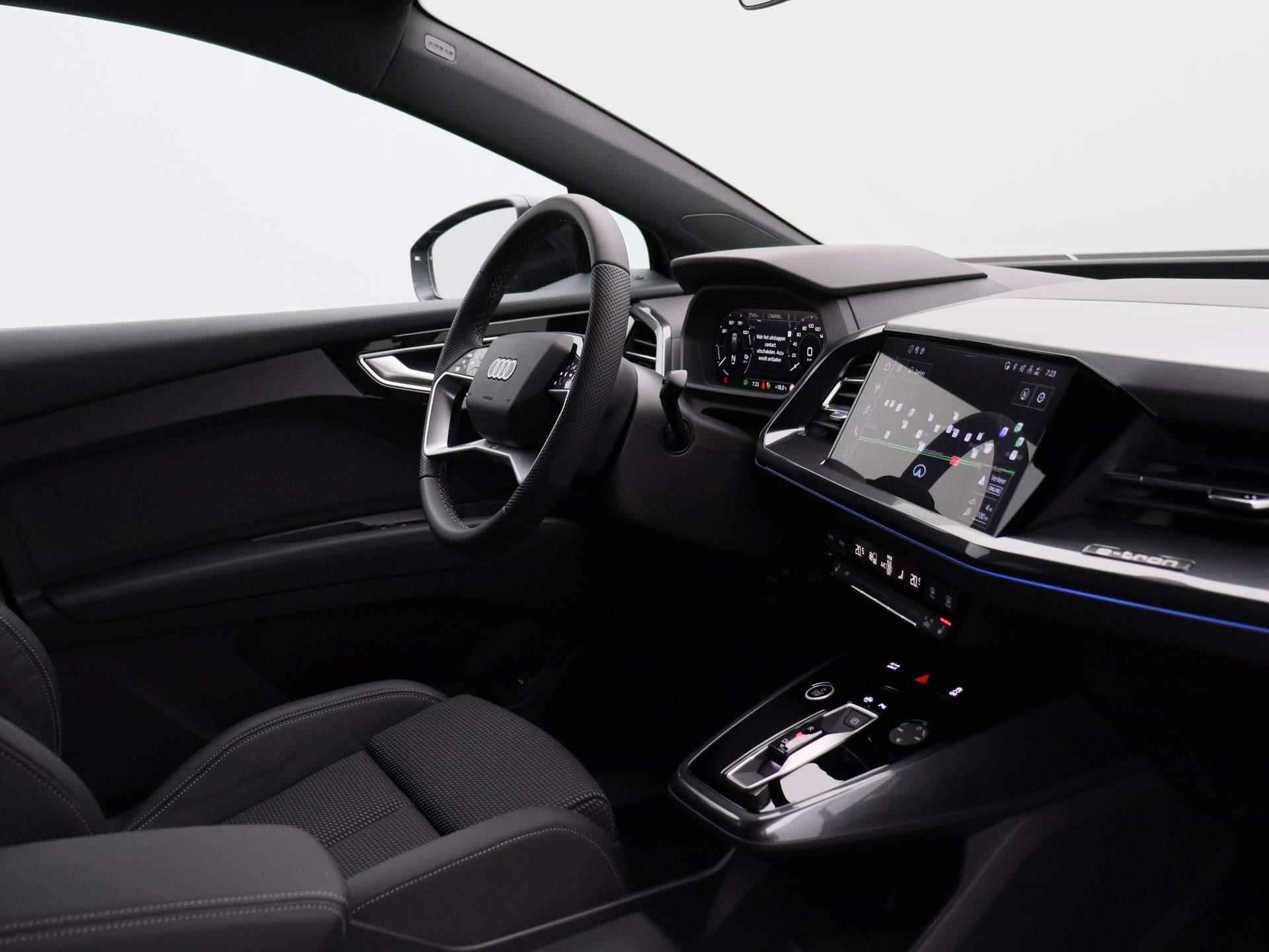 Audi Q4 Sportback e-tron 45 Edition 82 kWh 286 PK | S-line interieur | Automaat | Navigatie | Cruise Control | Trekhaak | Parkeersensoren | Stoelverwarming | Apple Carplay | Android Auto | Lichtmetalen velgen | Climate Control | - 34/46