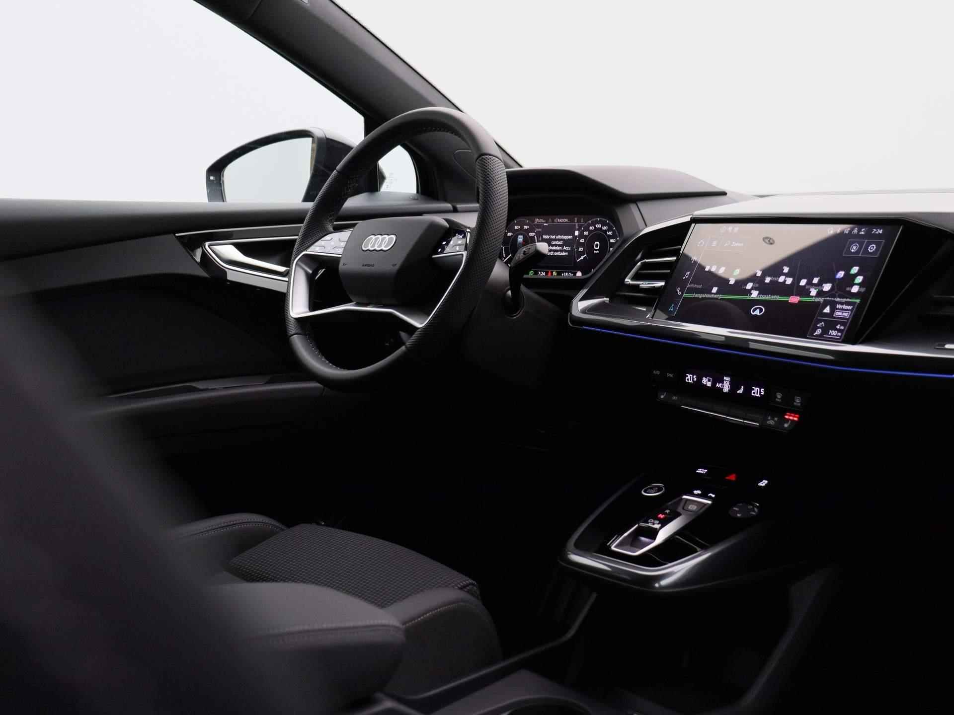 Audi Q4 Sportback e-tron 45 Edition 82 kWh 286 PK | S-line interieur | Automaat | Navigatie | Cruise Control | Trekhaak | Parkeersensoren | Stoelverwarming | Apple Carplay | Android Auto | Lichtmetalen velgen | Climate Control | - 38/46
