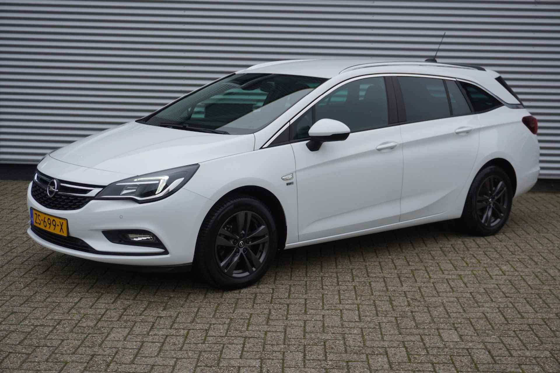 OPEL Astra Sports Tourer 1.4 Turbo 120 Jaar Edition / Trekhaak / PDC / Navi - 4/26