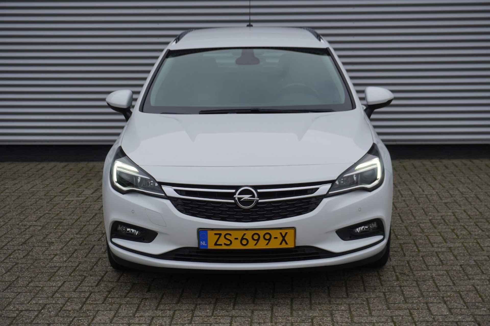 OPEL Astra Sports Tourer 1.4 Turbo 120 Jaar Edition / Trekhaak / PDC / Navi - 7/26