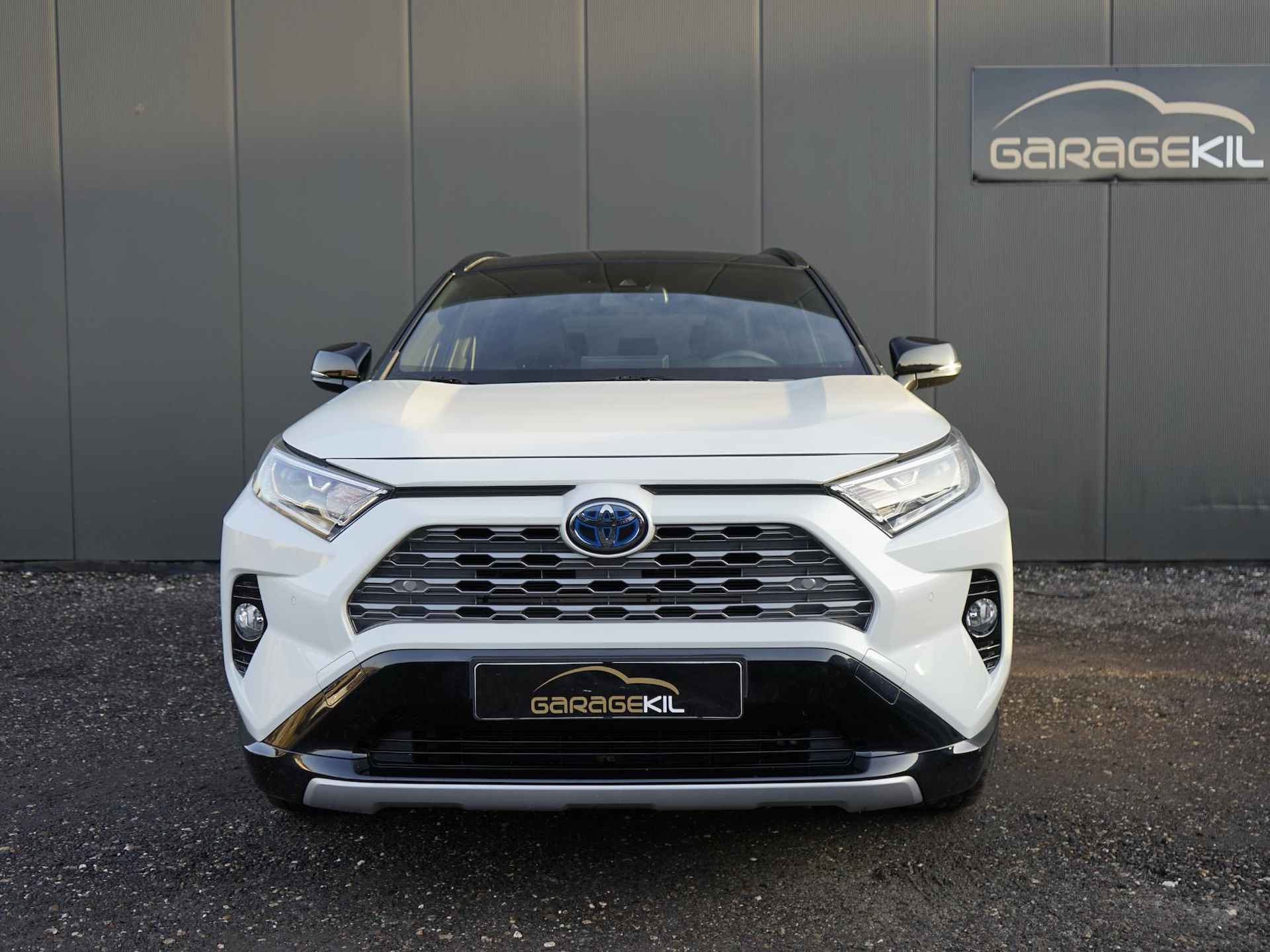 Toyota RAV4 2.5 Hybrid AWD Bi-Tone Dealer onderh. / Fabrieksgarantie / Trekhaak / Leer / Elek.stoel / Clima / 1650 geremd - 3/32