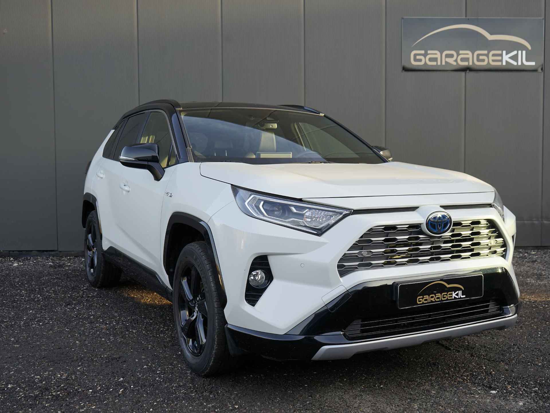 Toyota RAV4 2.5 Hybrid AWD Bi-Tone Dealer onderh. / Fabrieksgarantie / Trekhaak / Leer / Elek.stoel / Clima / 1650 geremd - 4/32