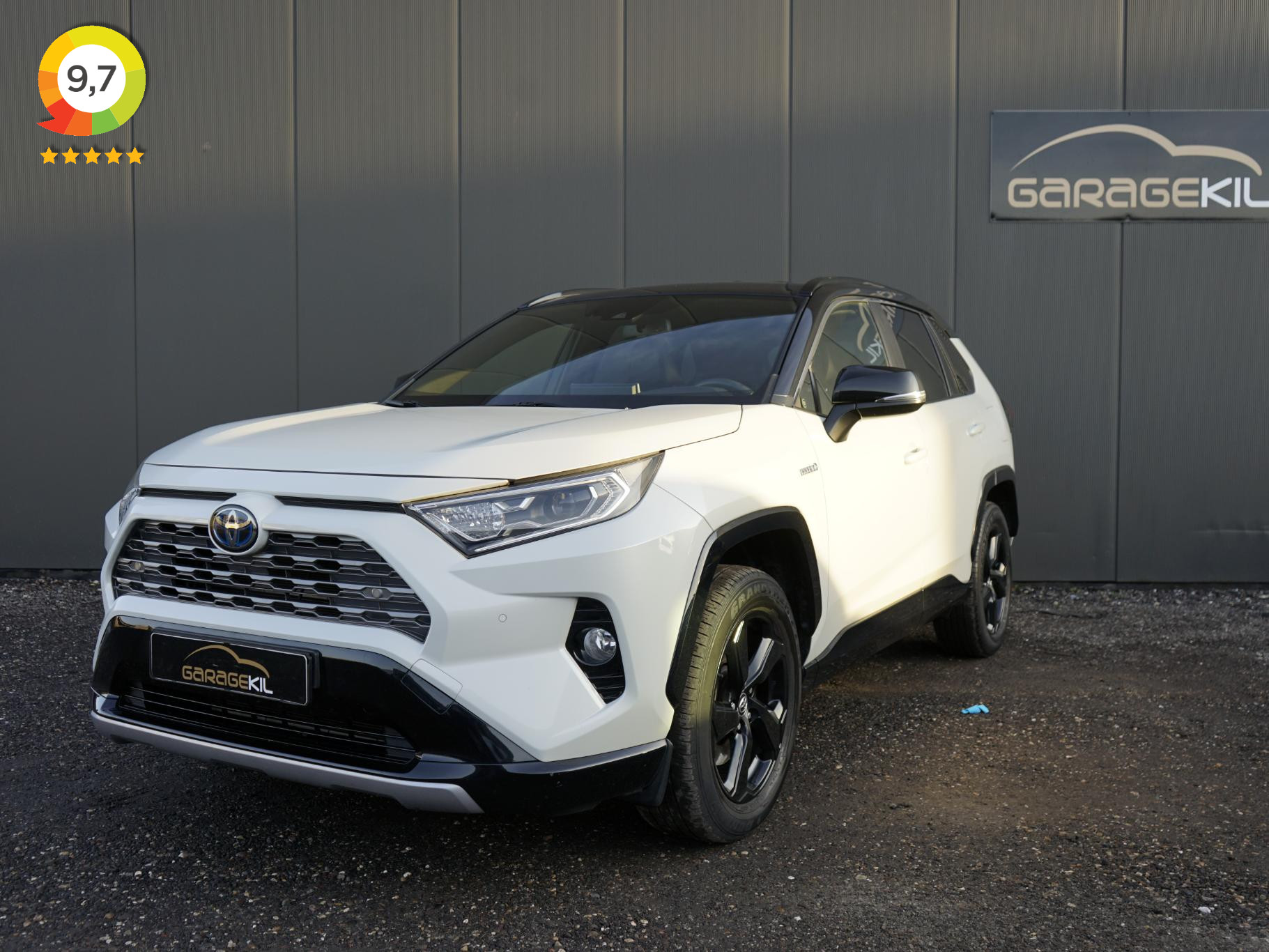 Toyota RAV4 2.5 Hybrid AWD Bi-Tone Dealer onderh. / Fabrieksgarantie / Trekhaak / Leer / Elek.stoel / Clima / 1650 geremd