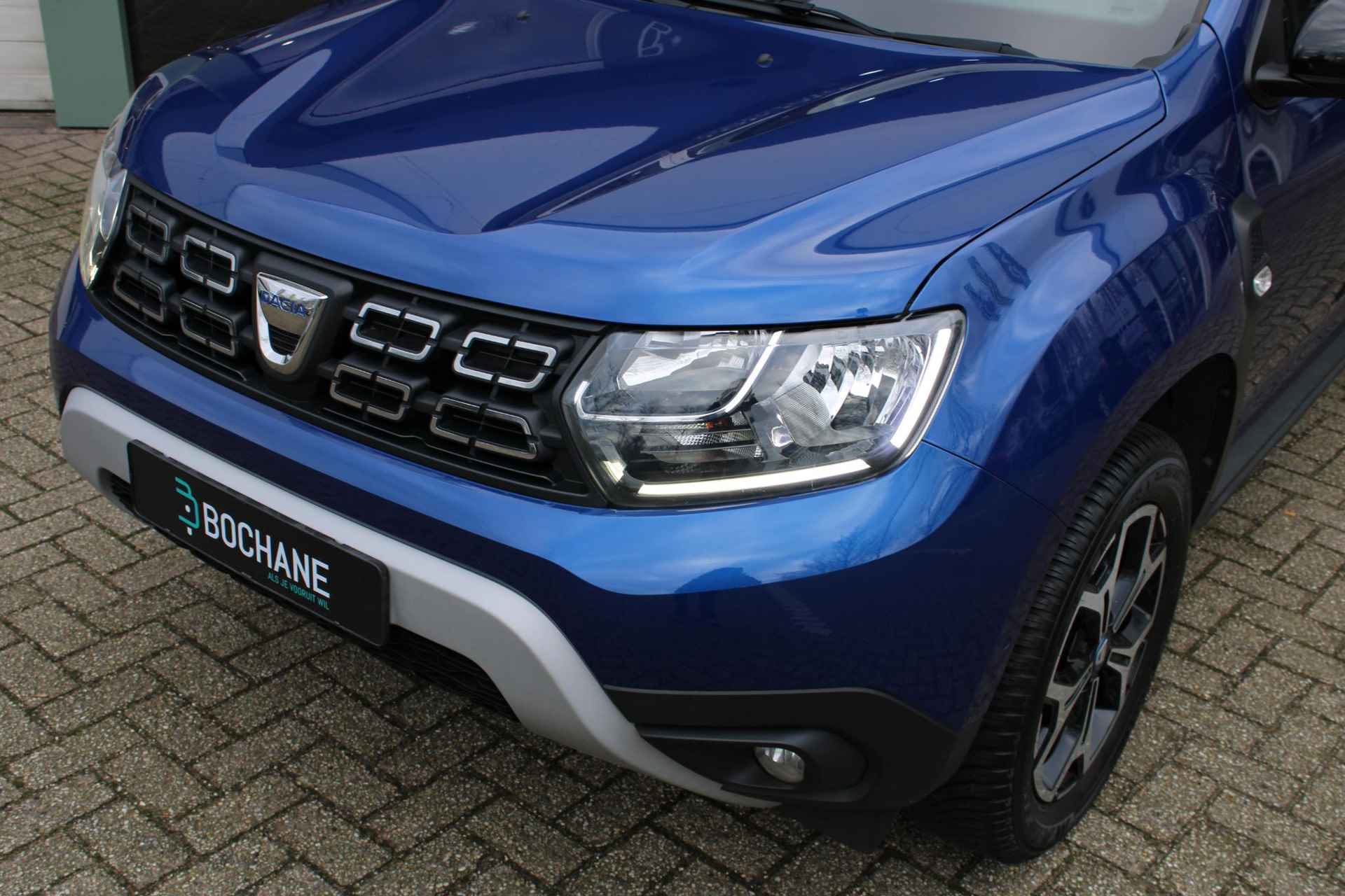 Dacia Duster 1.0 TCe Bi-Fuel Serie Limitee 15th Anniversary | Navigatie | Trekhaak | All-season banden - 9/41